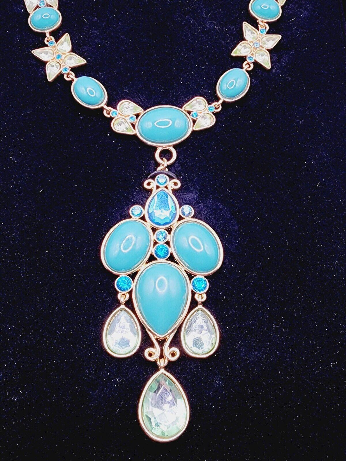 Simply Beautiful! Vintage Designer Signed SCAASI Turquoise and Crystal Gold tone Festoon Runway Necklace. Hand set with Faux Turquoise and Crystal Stones. Necklace measures approx. 18