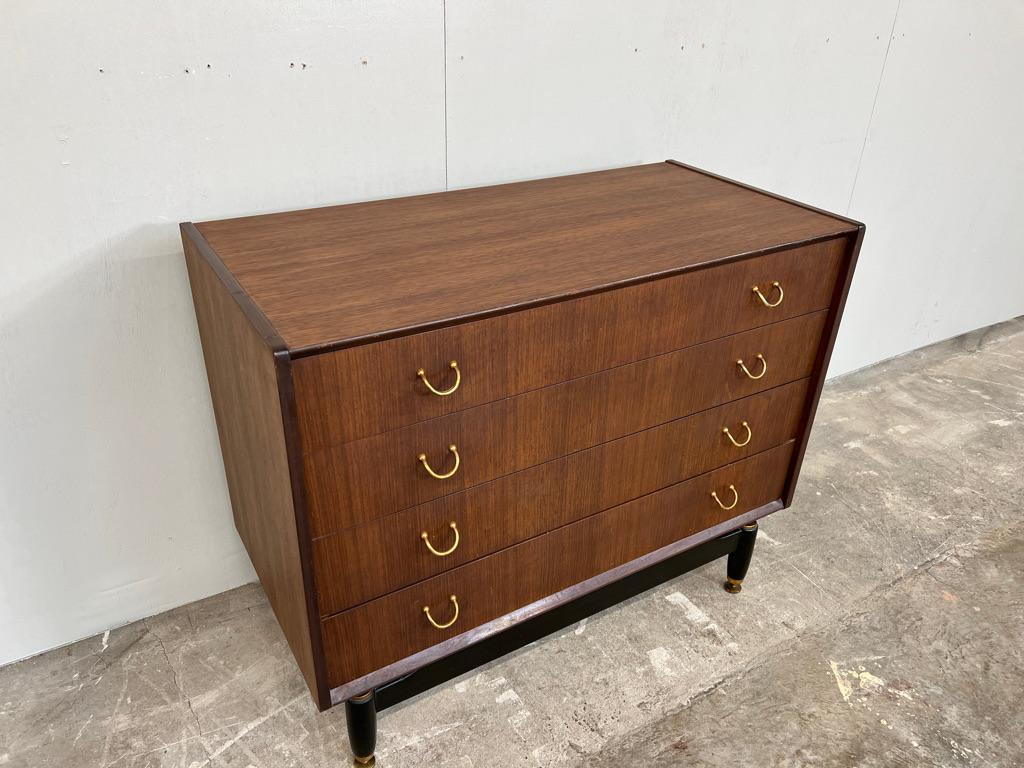 Mid-Century Modern Designer Vintage Retro 1950s Teak Chest of Drawers standing on ebonised legs For Sale