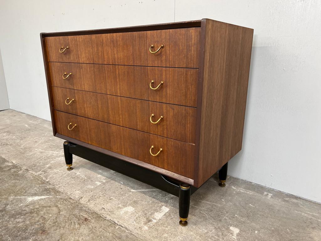 20th Century Designer Vintage Retro 1950s Teak Chest of Drawers standing on ebonised legs For Sale
