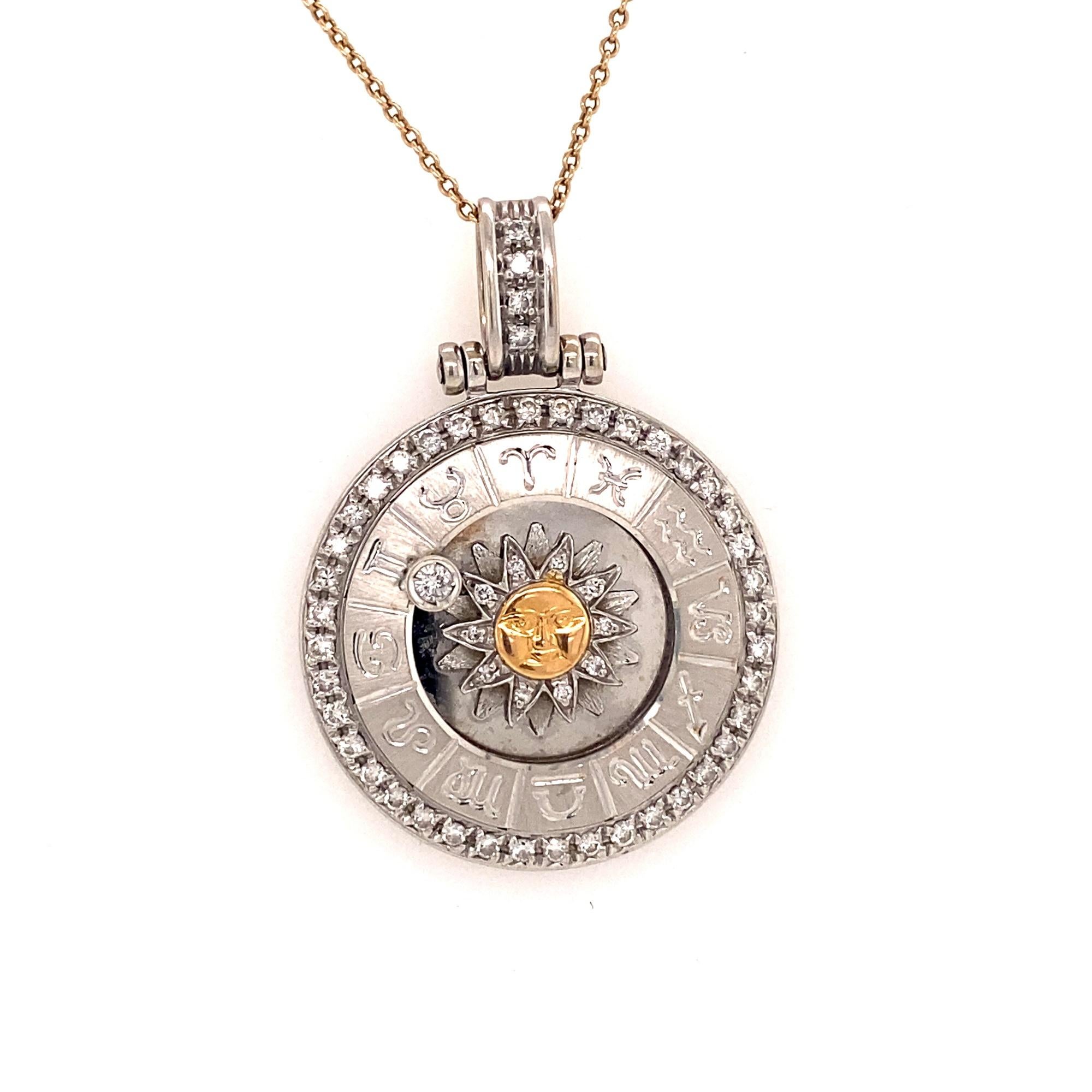 This is a stunning Zodiac pendant with all of the astrology signs surrounding a sun with 18K white and yellow gold.  The pendant has full cut diamonds the largest in the center .07 moves around to what ever astrology sign you desire. The 55 diamonds