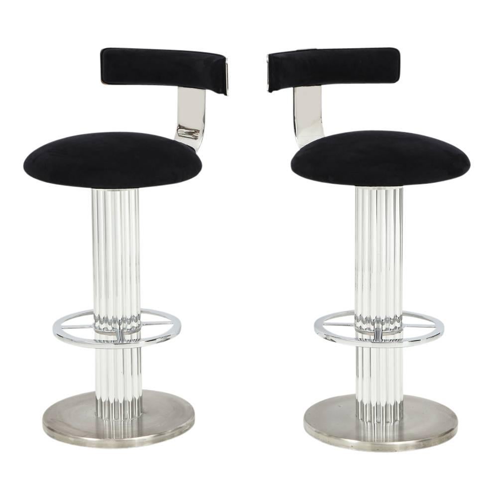 Pair of Designs for Leisure bar stools nickel signed, USA, 1980s. Two swivel barstools in nickel-plated steel and aluminium by Designs for Leisure of Mt. Kisko New York. The now defunct company was a high quality seating resource for the interior