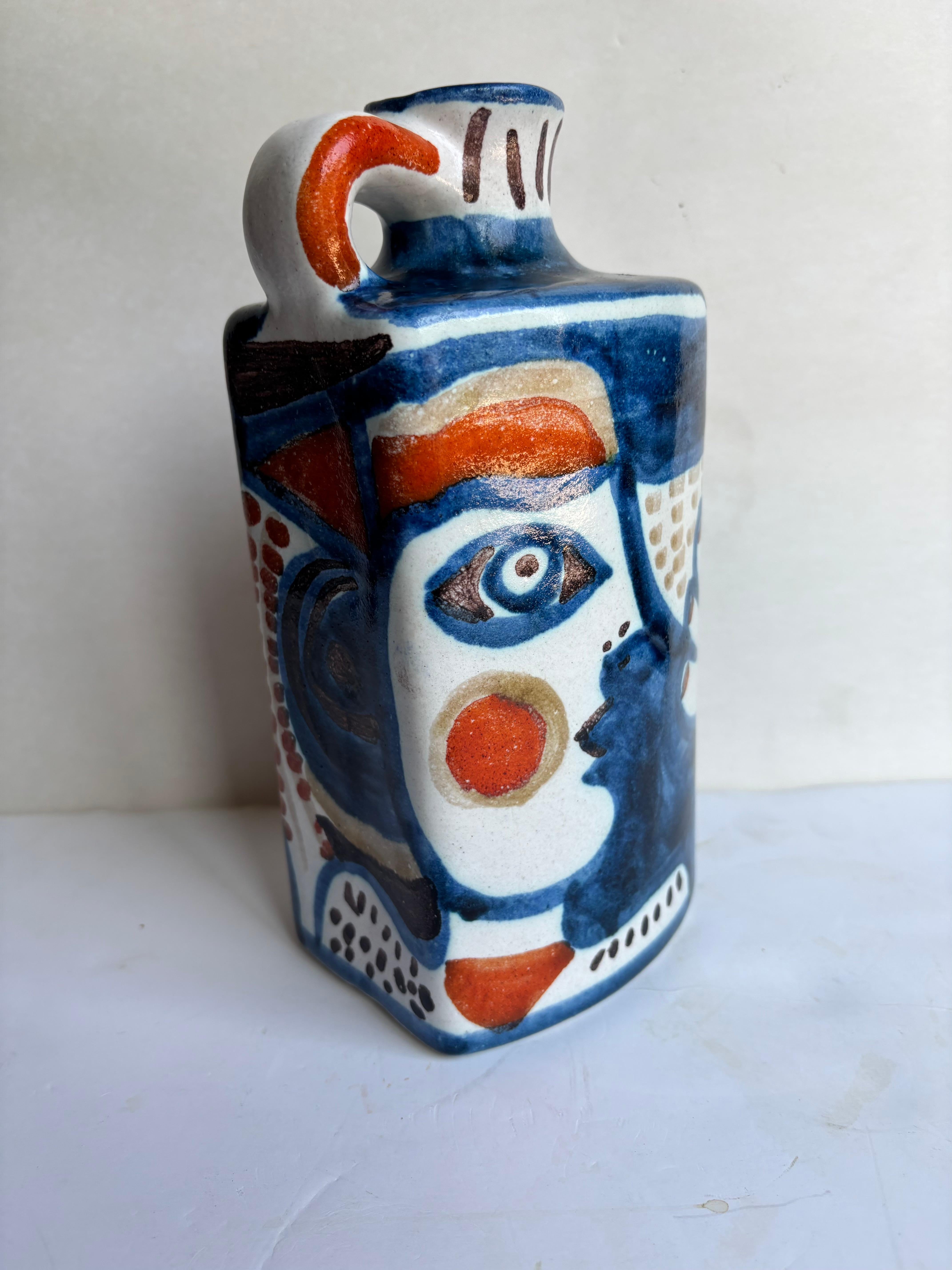 Rare ceramic / pottery bottle by Desimone , attributed to himself creator and founder Giovanni DeSimone , also dated . appears 1961 .