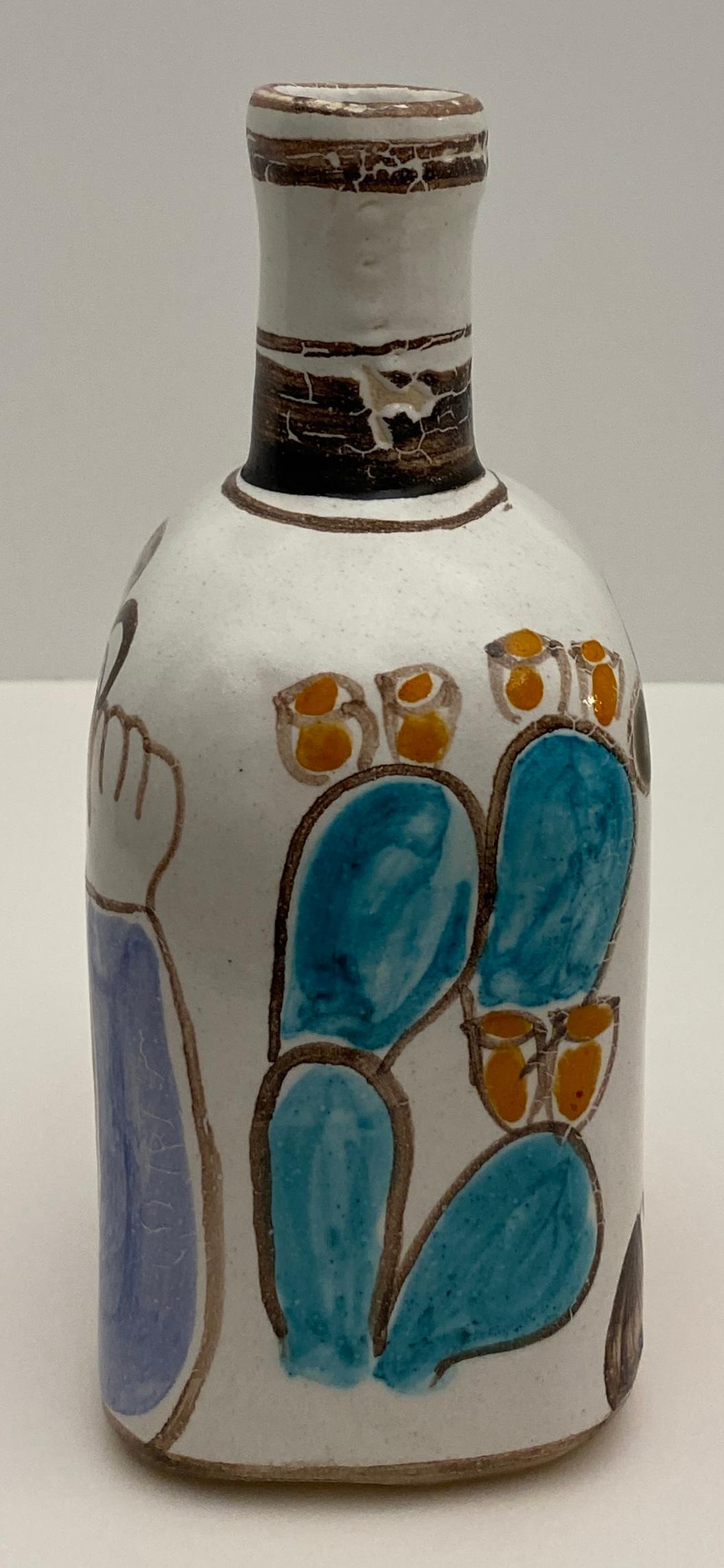 One-of-kind vase, hand-crafted and hand-painted by Giovanni Desimone.  Great design with whimsical images on both sides.  

Signed and numbered, this rare piece is colorful as the usual pieces by Desimone are. Very well-made piece that will add
