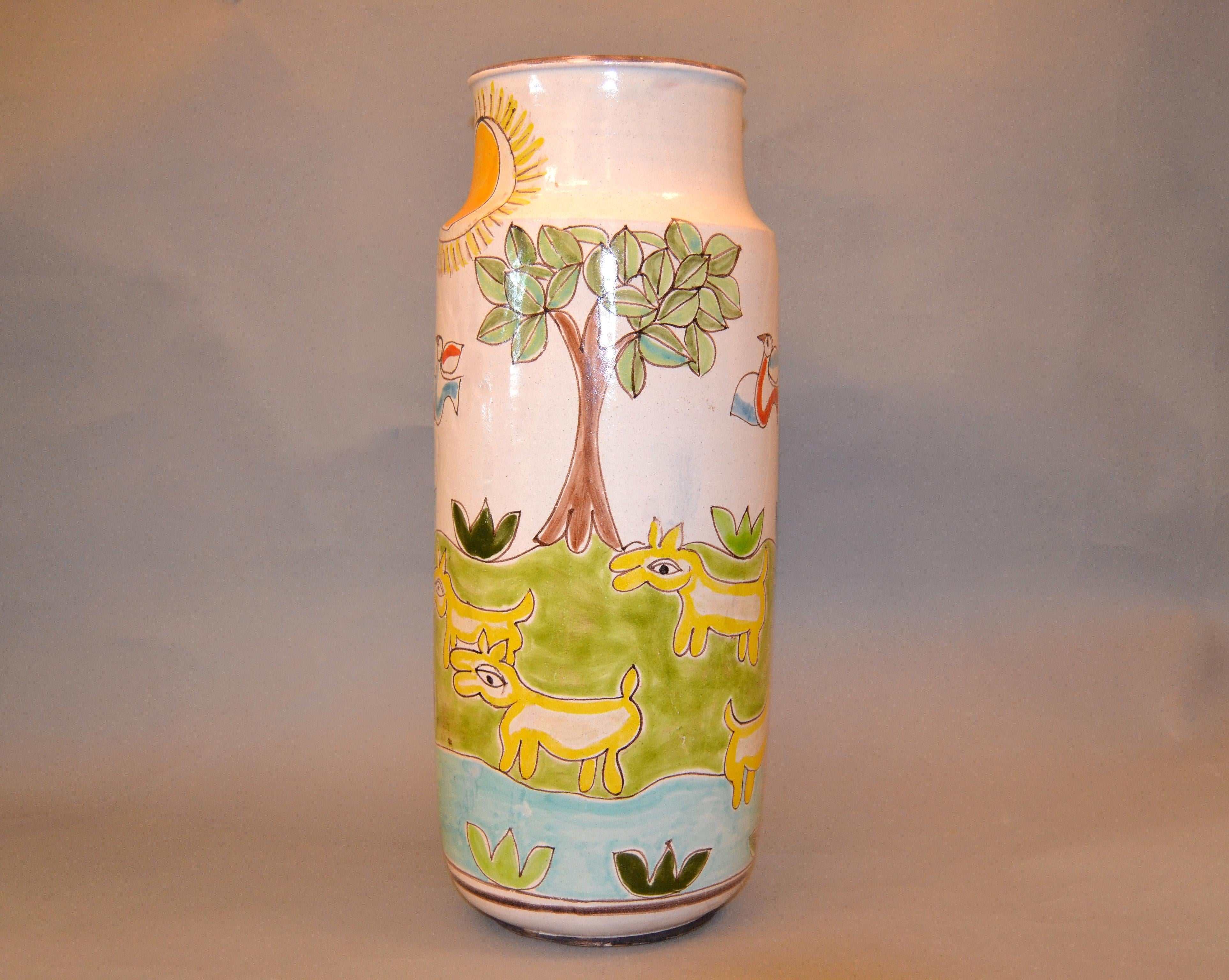 Original Italian Giovanni Desimone hand painted tall art pottery flower vase, vessel.
The glazed vase painting depicts a man playing the flute.
Marked and numbered on underside, 'DeSimone, Italy 3'.
THIS ITEM WILL BE PACKED AND BOXED VIA UPS TO