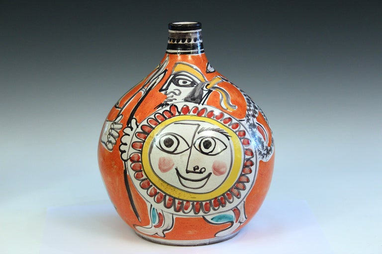 Vintage DeSimone pottery vase with marauding pirates or warriors on a vibrant orange ground, circa 1960's. Measures: 12 1/4