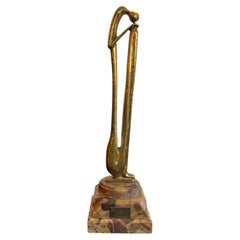 Desing: Carlos de Lamota,  Materials: Bronze and marble, Style : Art Deco