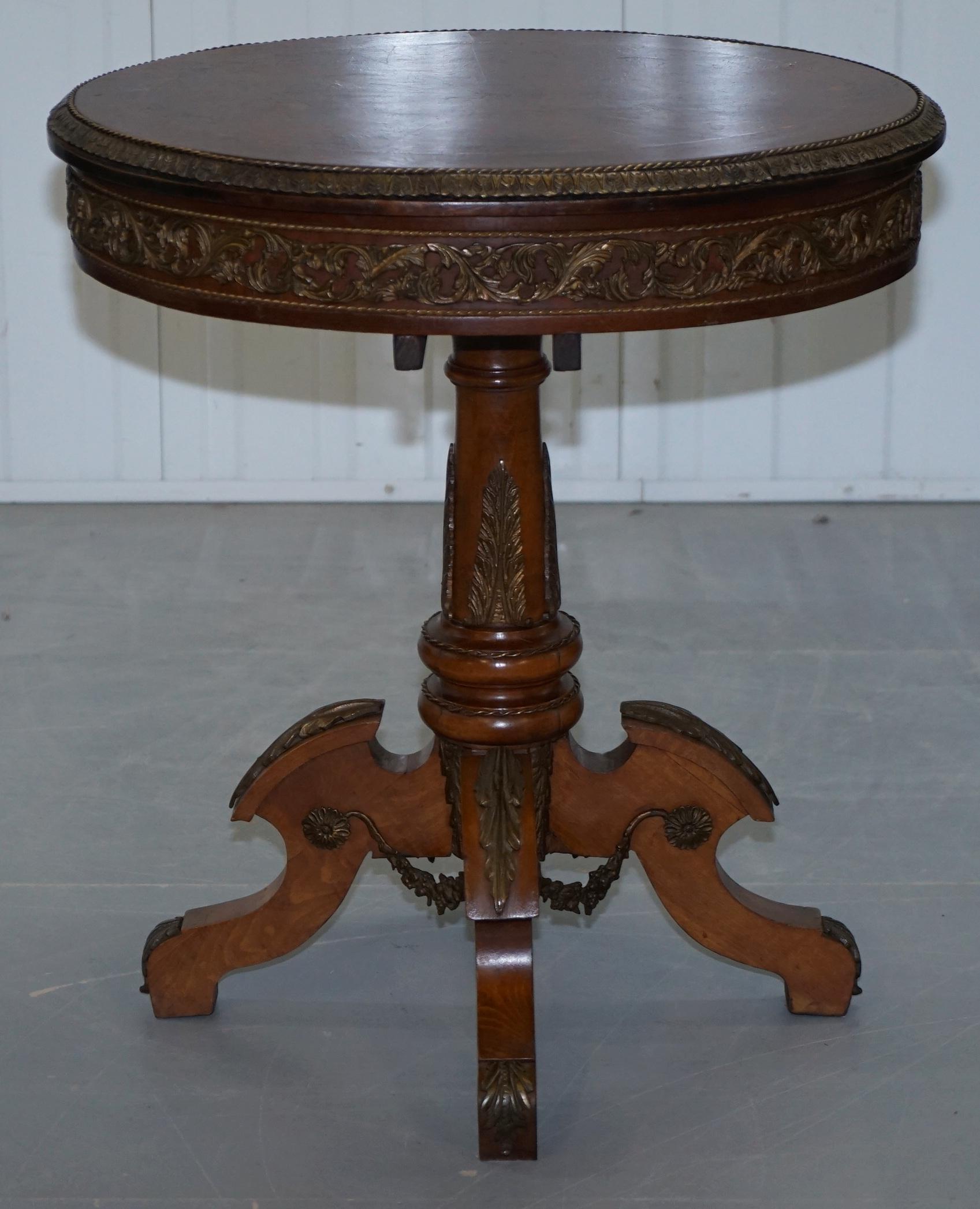 We are delighted to offer for sale this lovely walnut marquetry inlaid French side table covered in ormolu mounts all over

This table is stunning, very decorative, highly desirable, it’s a real signature piece which grabs attention from every