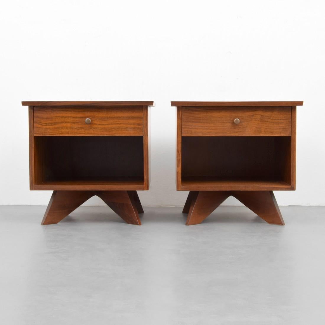 Pair of nightstands model no. 215 designed in 1958 by George Nakashima for his origins line, produced by the Widdicomb Furniture company, Grand Rapids, Michigan. The nightstands each feature one drawer and are in east Indian laurel veneers and solid