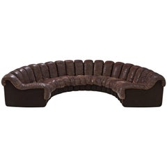 Desirable Patinated De Sede 'Snake' Non Stop Sofa in Dark Brown Leather