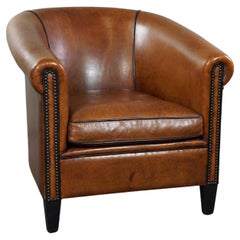 Desirable sheep leather club chair with the right character