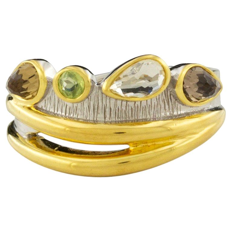For Sale:  Desire Cocktail Ring in 18K White Gold and Yellow Gold in Topaz