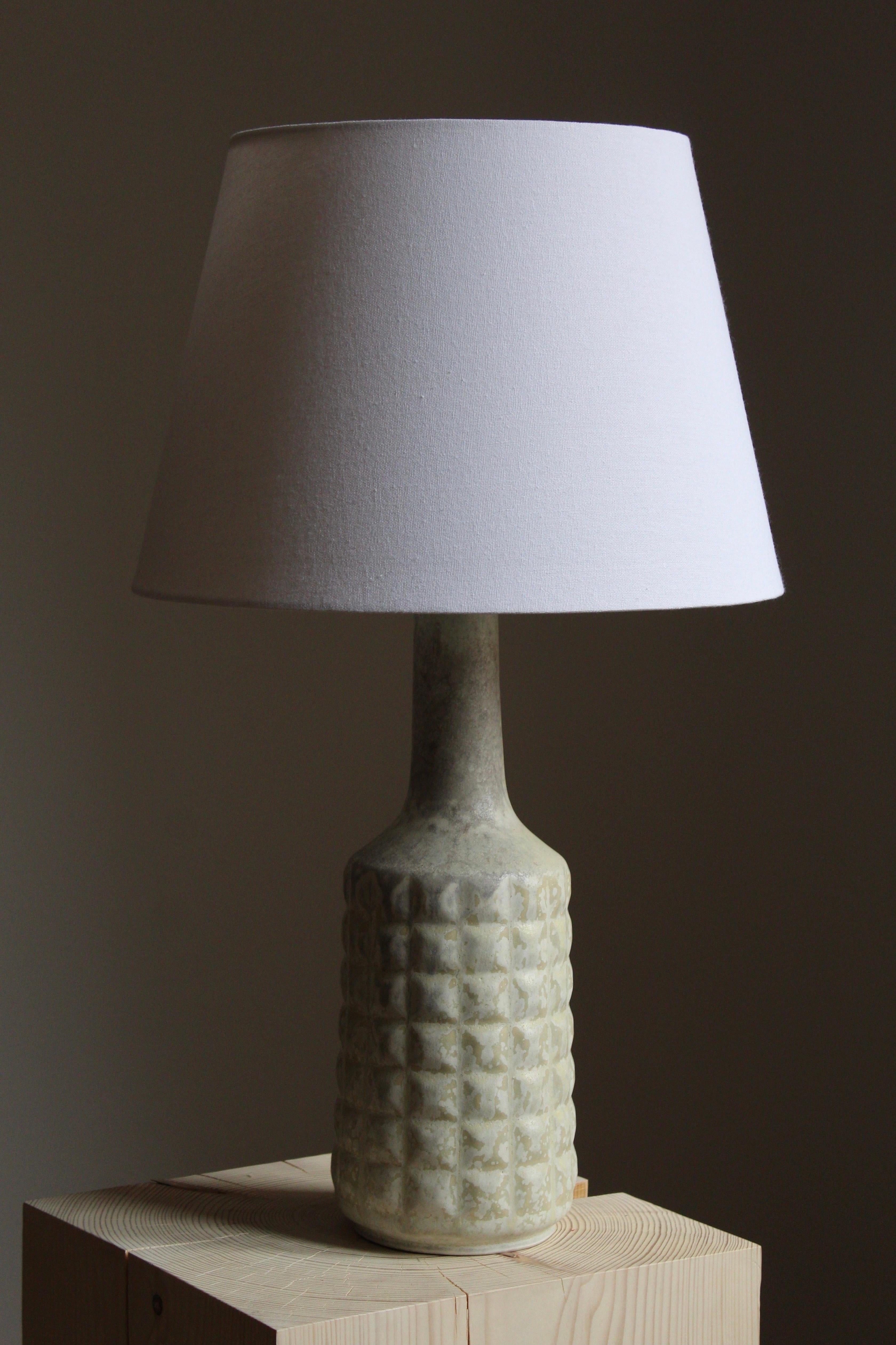 A table lamp, designed and produced by Desiree Stentøj, Denmark, 1960s. stamped. Lampshade not included.

