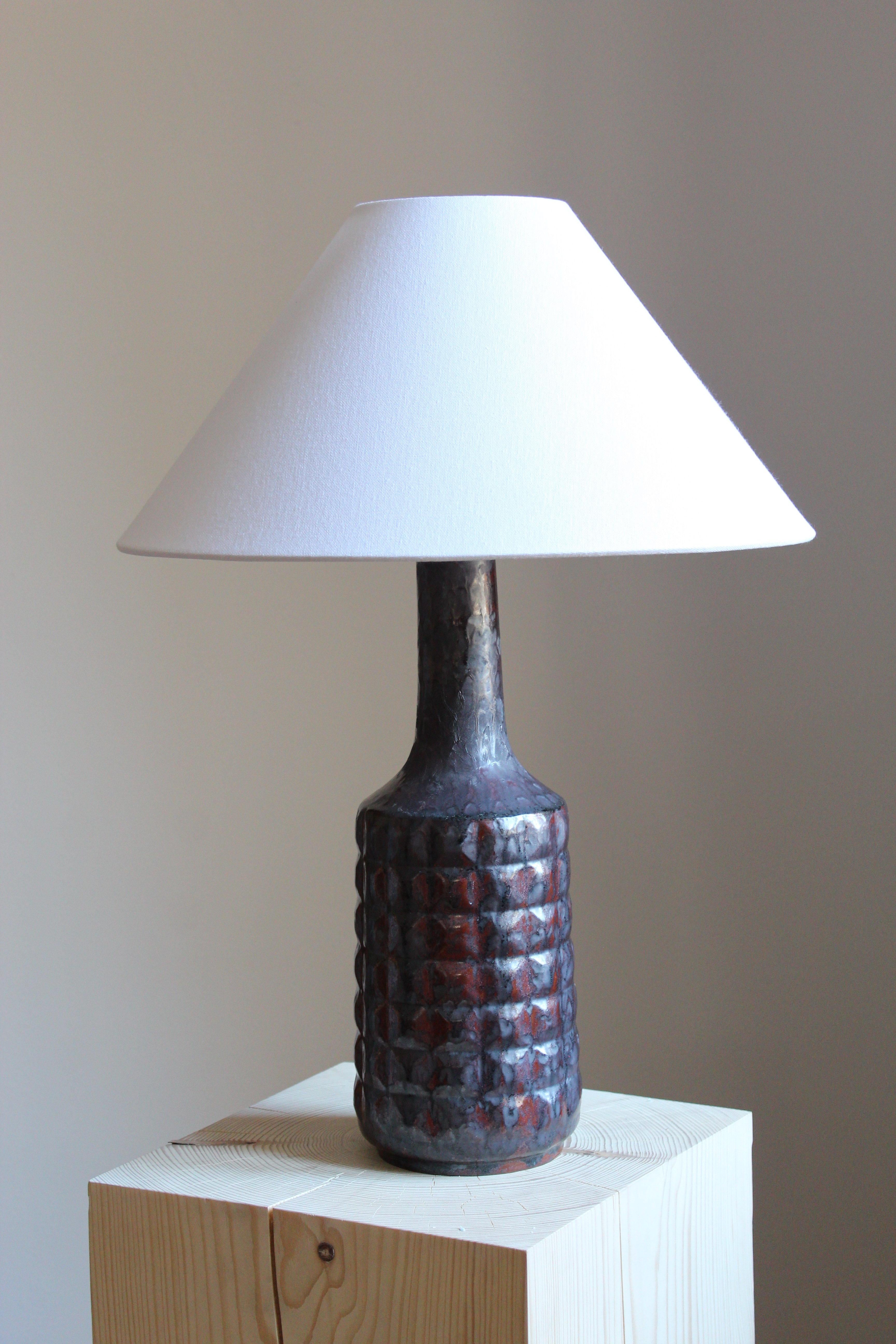 A table lamp, designed and produced by Desiree Stentøj, Denmark, 1960s. stamped. Lampshade not included.

Glaze features grey-black-red colors.
  