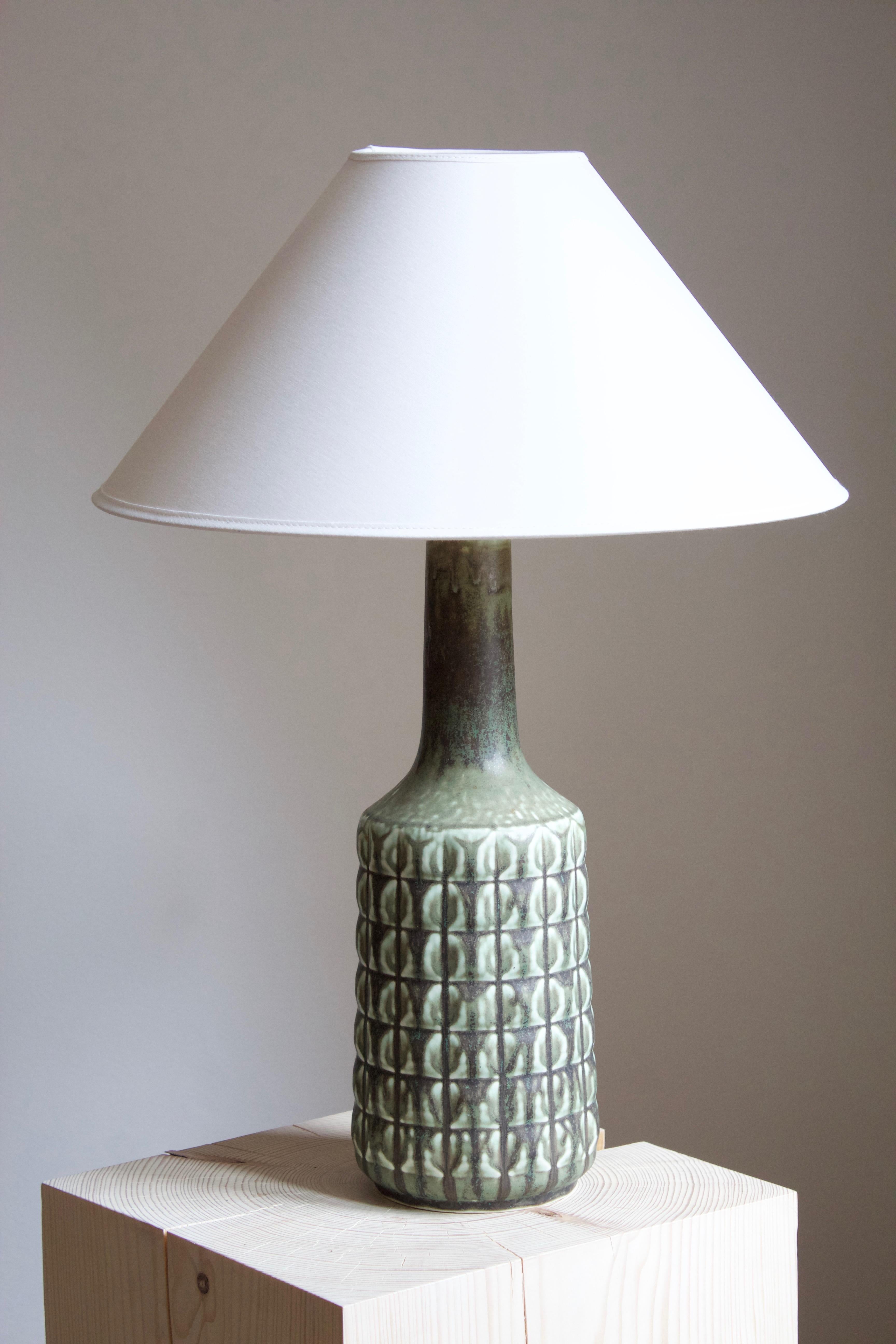 A table lamp, designed and produced by Desiree Stentøj, Denmark, 1960s. stamped.

Sold without lampshade. Stated dimensions exclude lampshade.
  
  