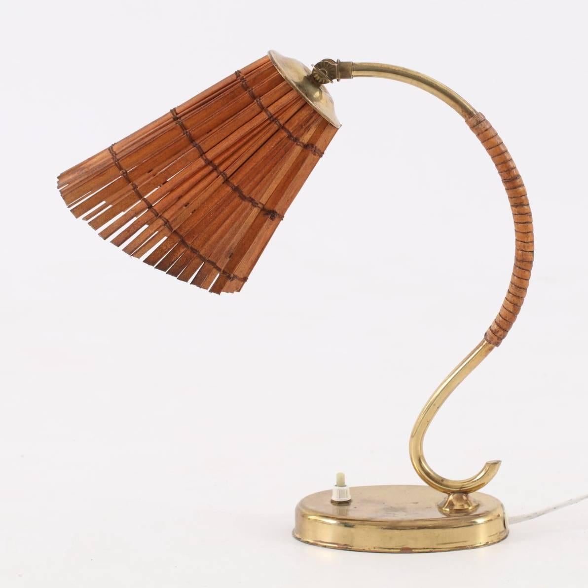 Desk or table lamp produced by Idman, Finland, 1950s. Measures: 48cm high.  Ships worldwide.
