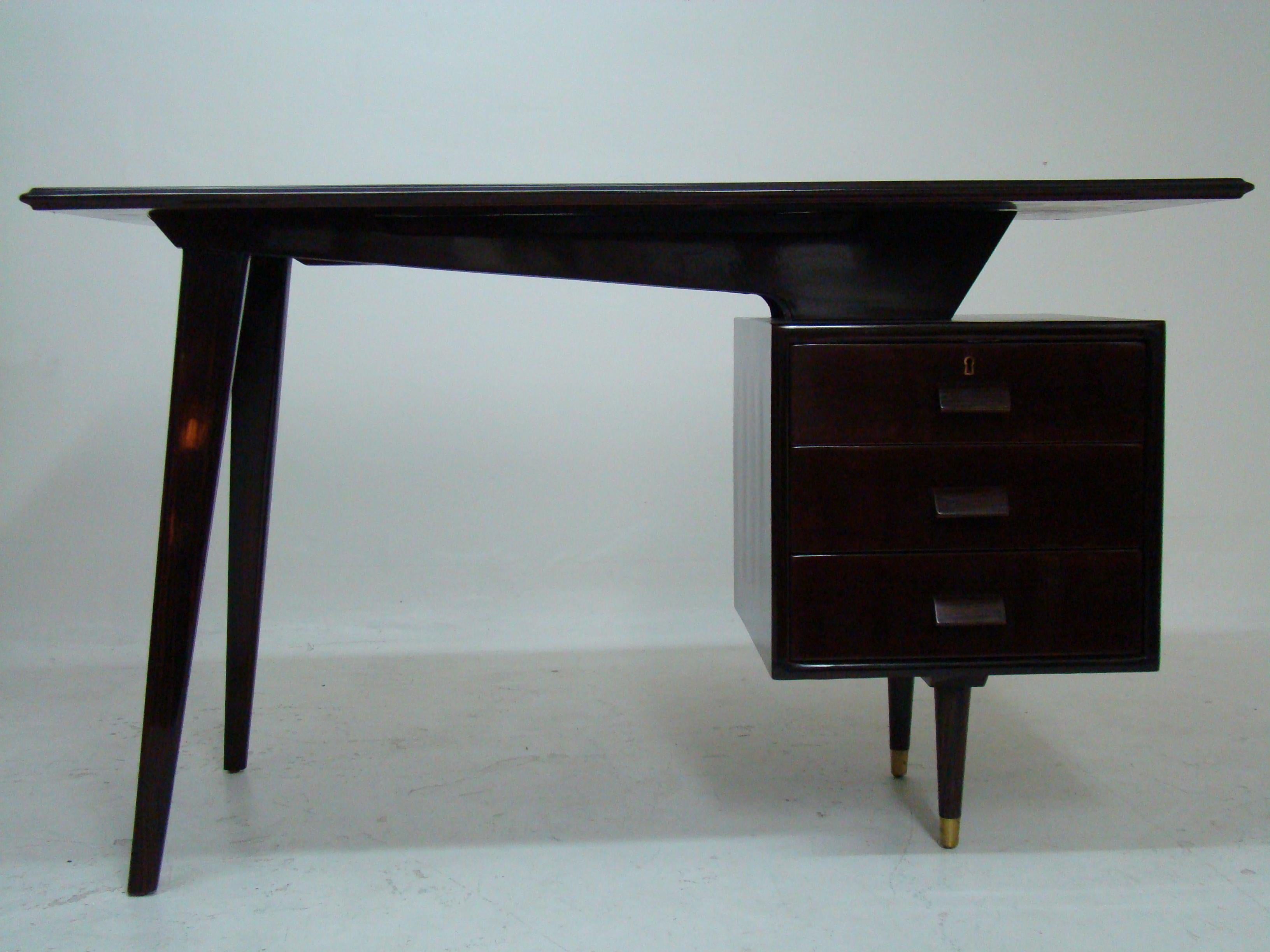 French Desk style: Art Deco
Year: 1940
Material: Wood and bronze
It is an elegant and sophisticated dream desk. 
The quality of the furniture and the exotic wood used make it unique. It is an icon of distinction.
You want to live in the golden