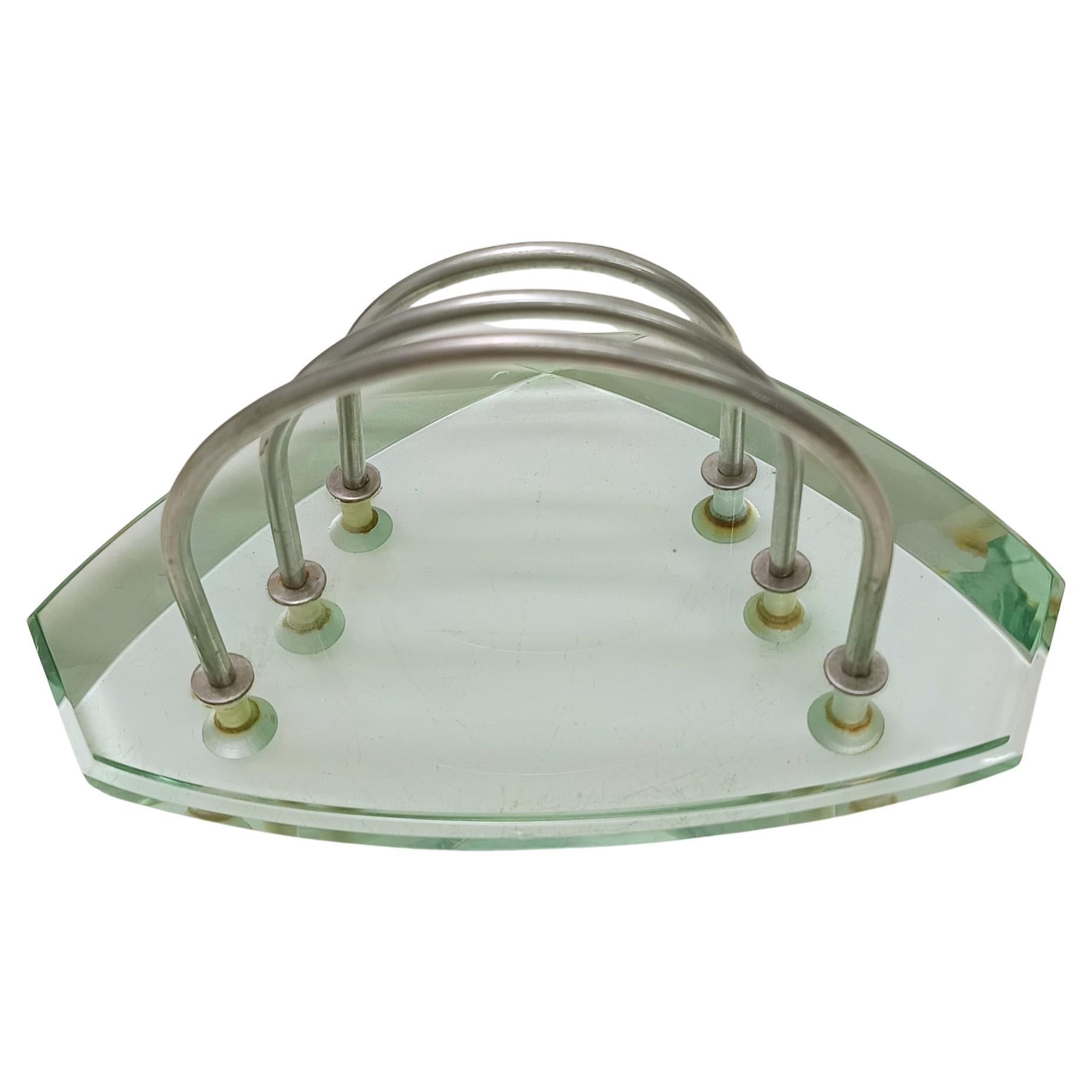 Made in Italy, anni '50. 
È realizzato in vetro e metallo color acquamarina con uno spessore di 3 centimetri. 
Si tratta di un pezzo vintage, quindi potrebbe presentare lievi tracce d'uso, ma può essere considerato in ottime condizioni originali e
