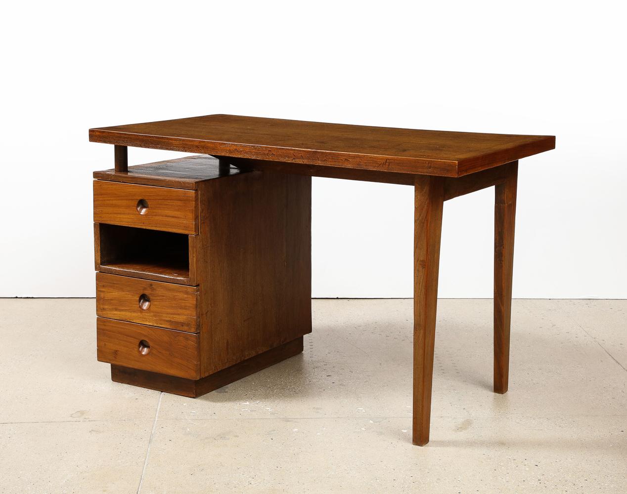 Teak, bamboo caning, fabric. Desk with 3 drawers and 1 open compartment. and matching chair. This desk is a very unusual variant, and one that we have not seen elsewhere. Price shown is for both pieces.
Chair h. 31