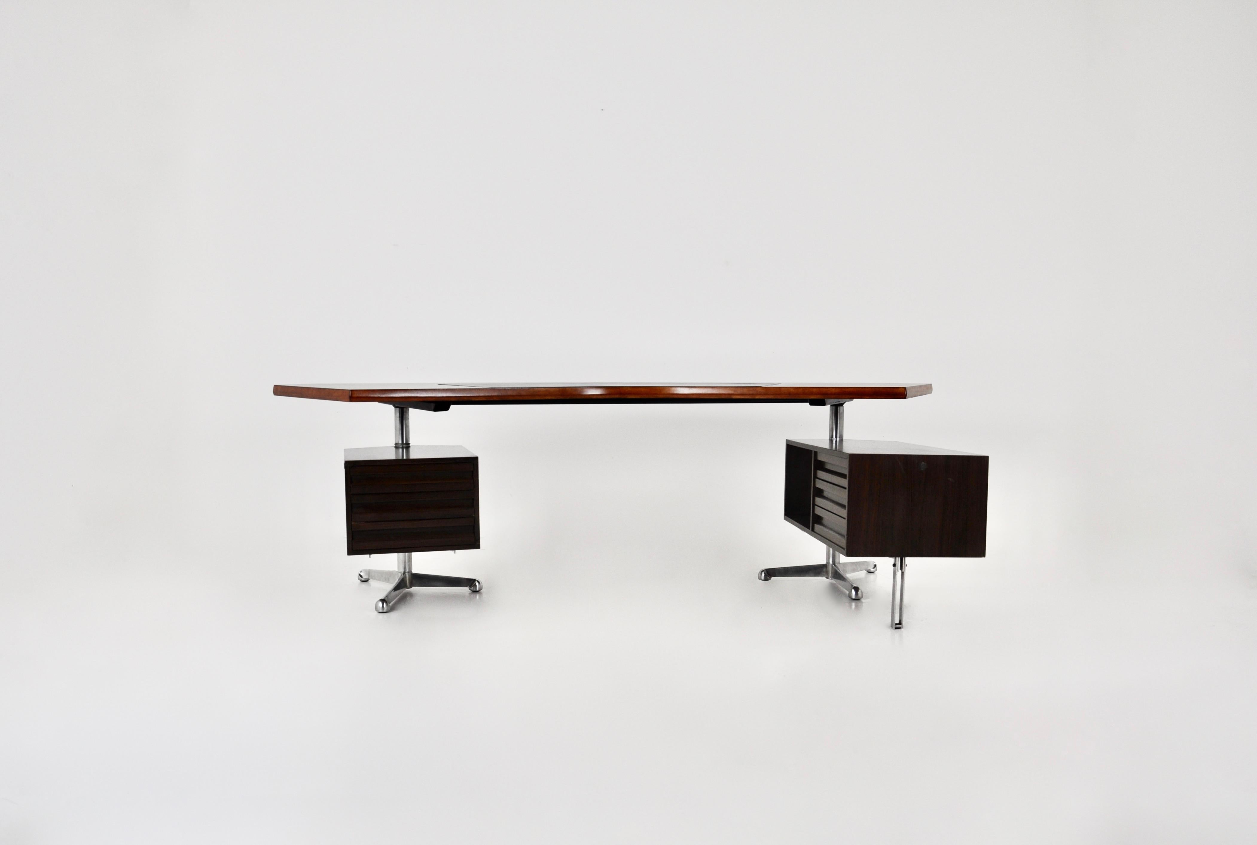 Desk in wood, metal and black leather. Stamped Tecno on the foot and in the drawer. 2 Modules, one with 3 drawers (Height: 54 cm, Length: 55 cm, Width: 42 cm) and another with 3 drawers and storage (Height: 54 cm, Length: 96 cm, Width: 42 cm). No