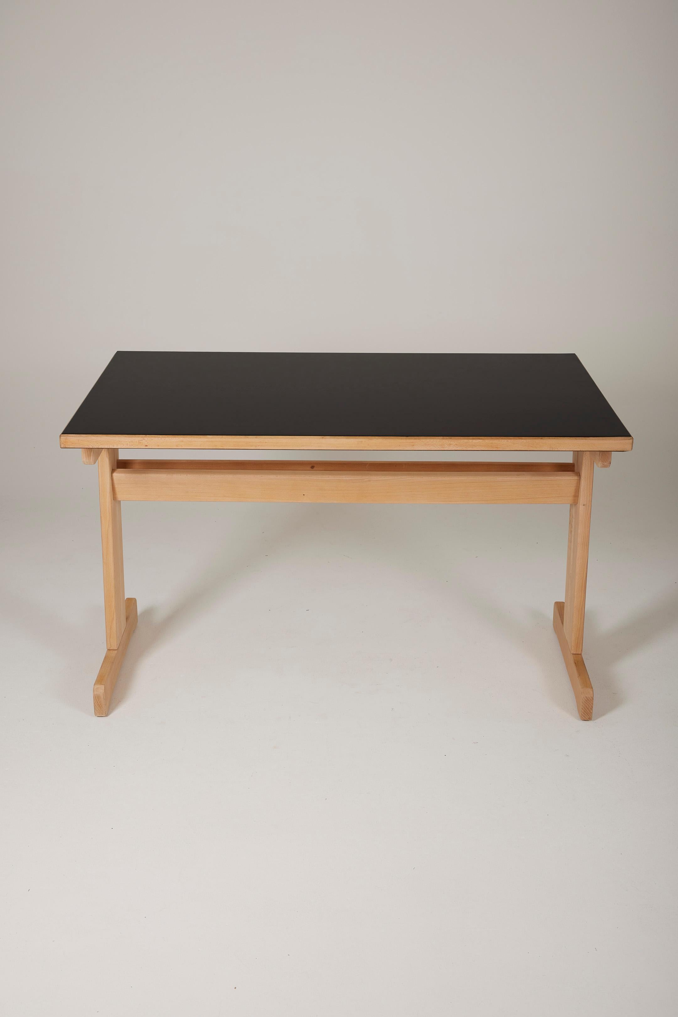Refectory table by the Lyon-based designer André Sornay. Wooden frame and black lacquered tabletop, 1960s. In good condition. LP1149. 