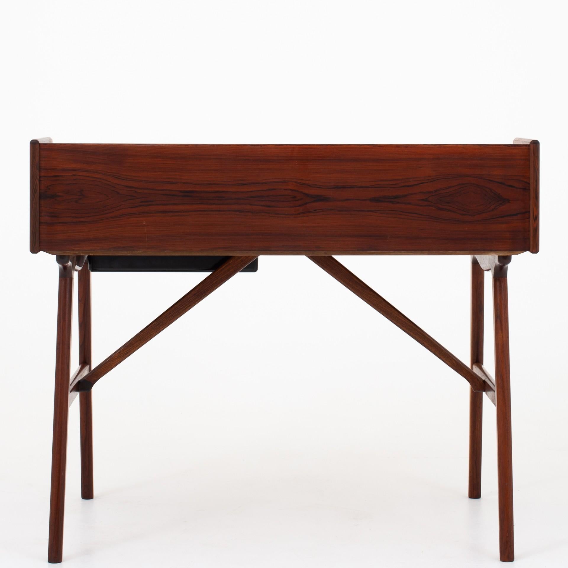 Desk or dressing table in rosewood with drawers, flap and mirror. Model 64. Maker Vinde Møbelfabrik.