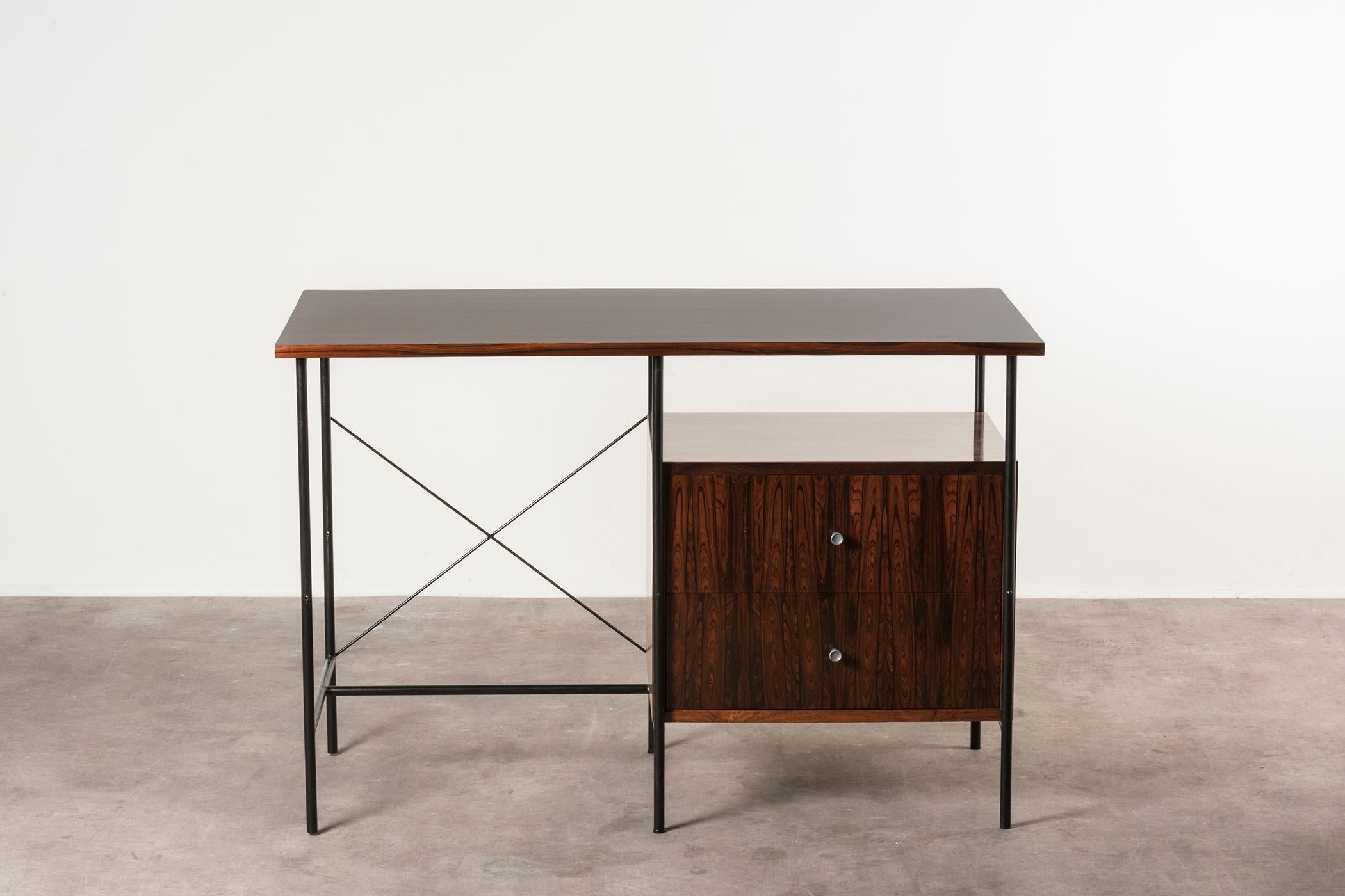 Desk by Geraldo de Barros. Brazil, 1950s. 
Manufactured by Unilabor. Wood, black painted metal, brass details. Measures: 109 x 52 x h 74 cm 
42.9 x 20.4 x h 28.9 in.
Item in fair condition, slight signs of wear and tear on wooden frame and metal