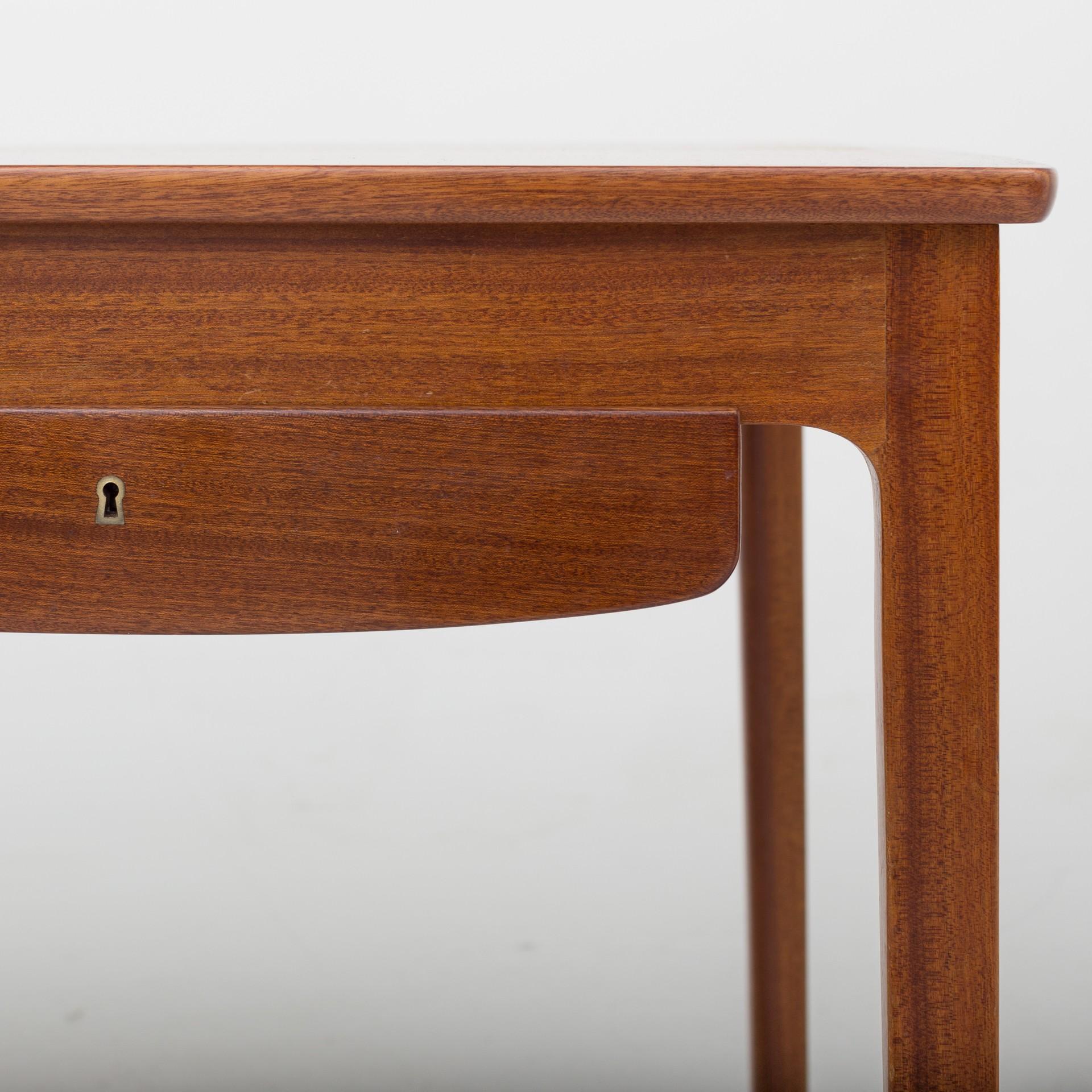 Desk in mahogany with one drawer. Maker A. J. Iversen.