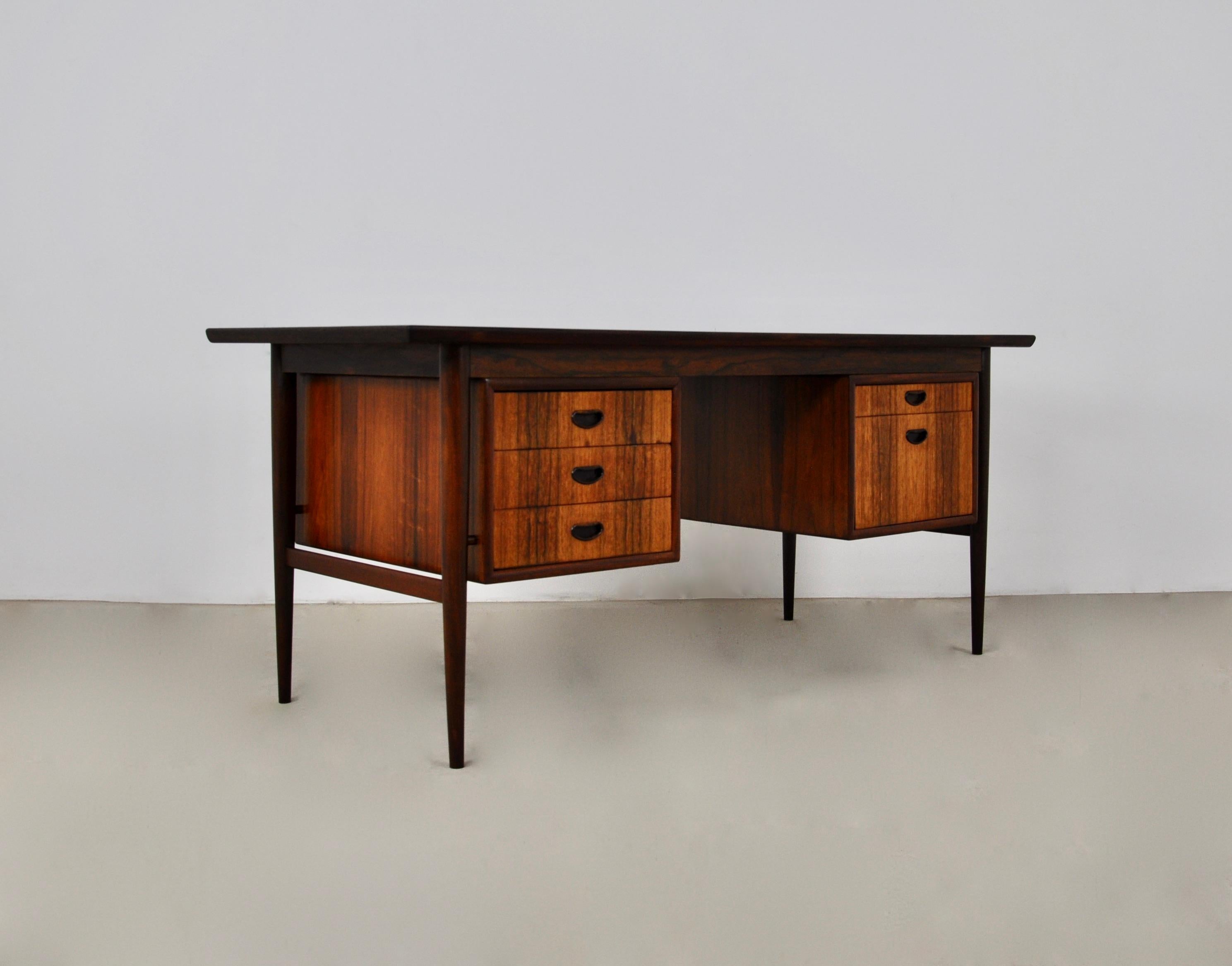 Wooden desk with metal handles designed by Oswal Vermaecke for v form.