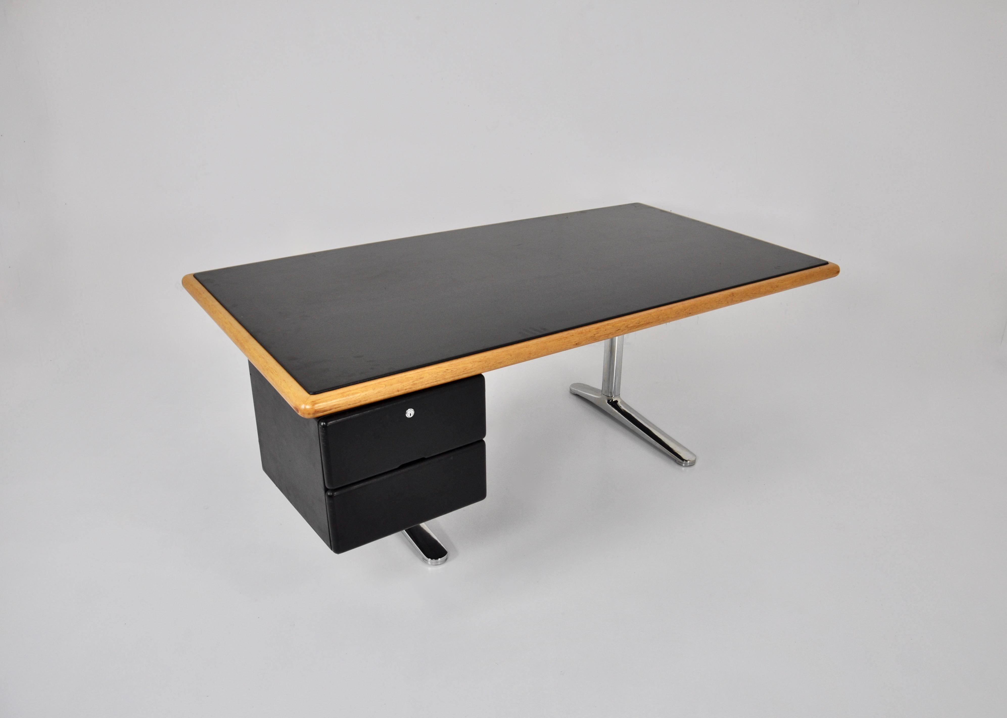 Desk with leather and wood shelf, metal legs. It has a leather storage box with two drawers. Wear and tear due to time and age of the desk.
 