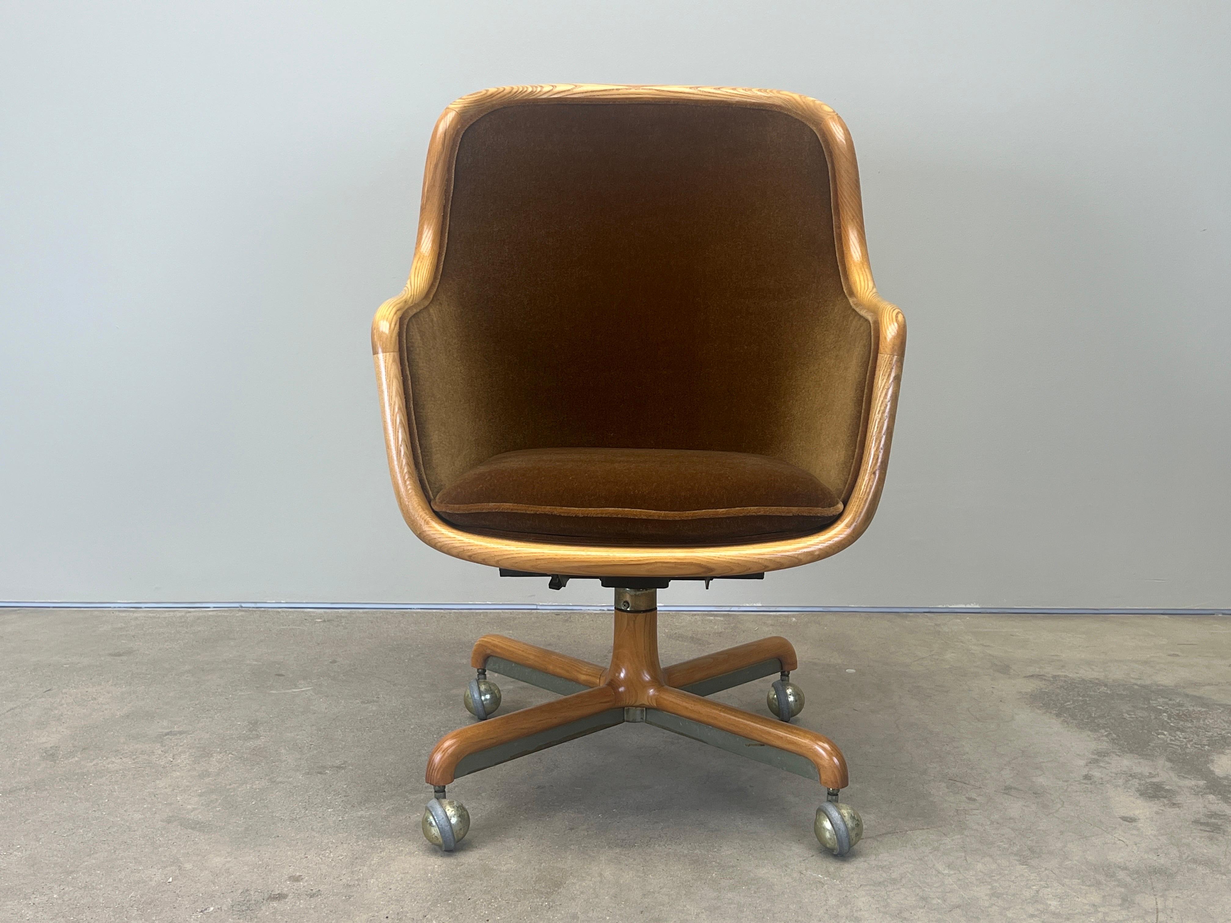 A high back, adjustable height, tilting desk chair by Ward Bennett. Refinished Ash frame with new mohair upholstery. 