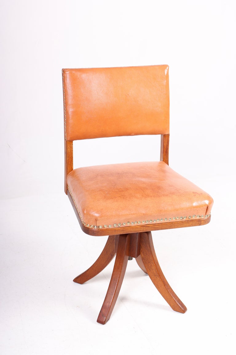Scandinavian Modern Desk Chair in Patinated Leather and Oak by Danish Cabinetmaker Frits Henningsen For Sale