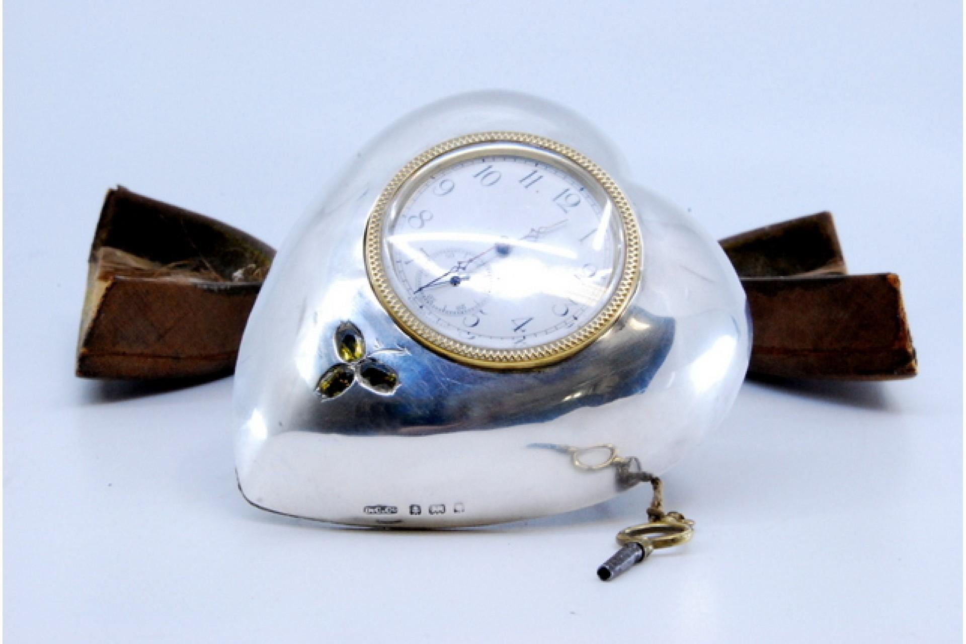 Desk clock built into a heart-shaped silver case For Sale