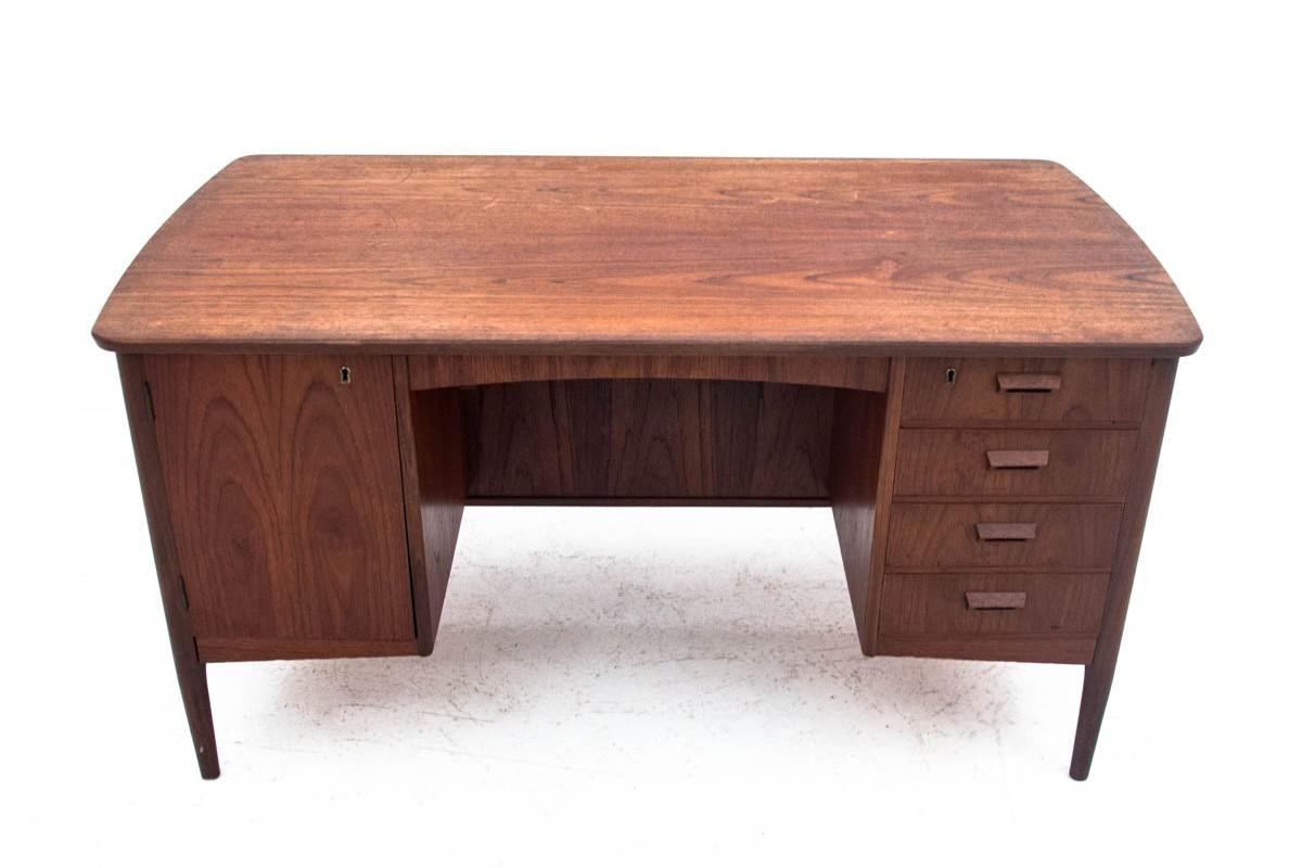 Desk from Denmark produced in the 1960s.

Dimensions: H 77 cm, W 144 cm, D 76 cm.