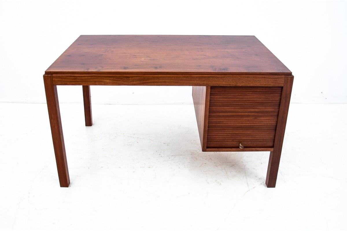 Desk together with one from Denmark. Furniture produced in the 1960s

Dimensions:

Desk: height 74 cm / width 130 cm / depth 85 cm

Armchair: height 90 cm / width 63 cm / seat height 48 cm.