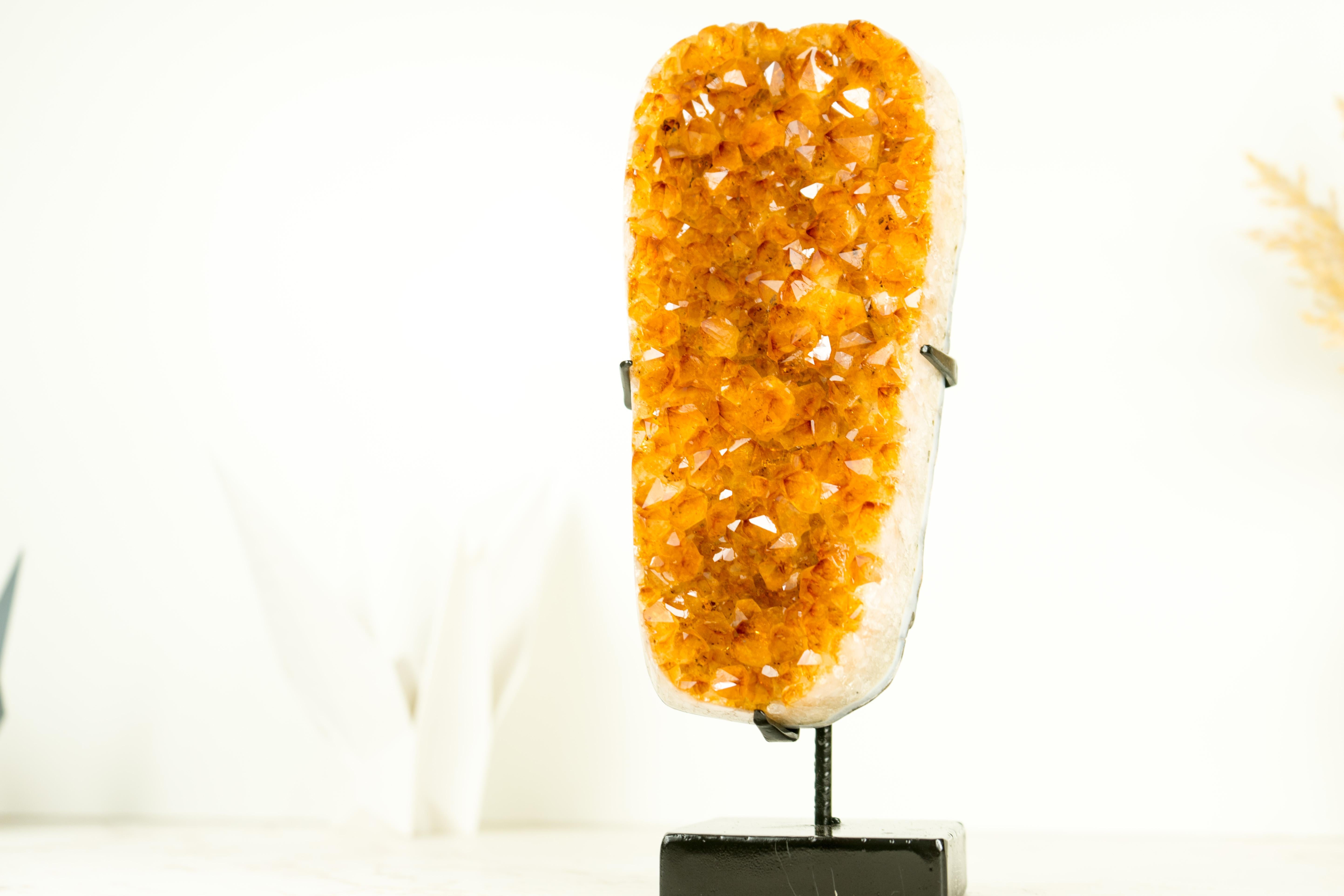 With its beautiful formations, radiant Golde Orange Citrine color, and wonderful aesthetics, this Citrine Specimen is the perfect addition to your crystal collection or a gorgeous decor piece for your console, desk, or shelf.

The Golden Citrine is