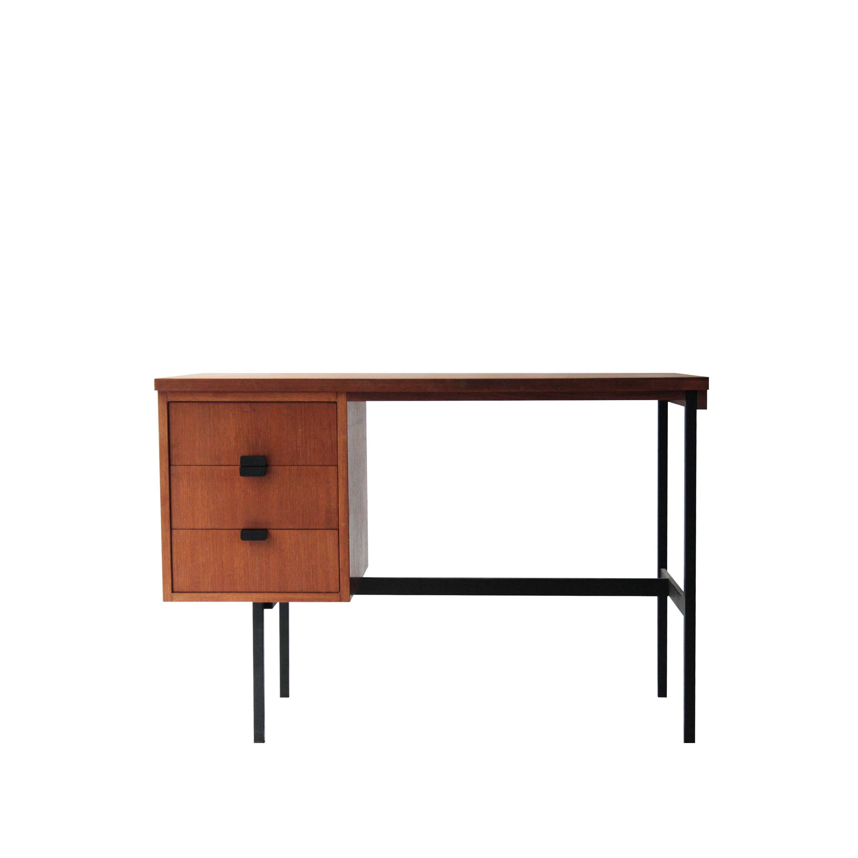 Desk designed by Cees Braakman (1917-1995) made of solid wood and covered in rosewood. Black lacquered metallic structure.
 