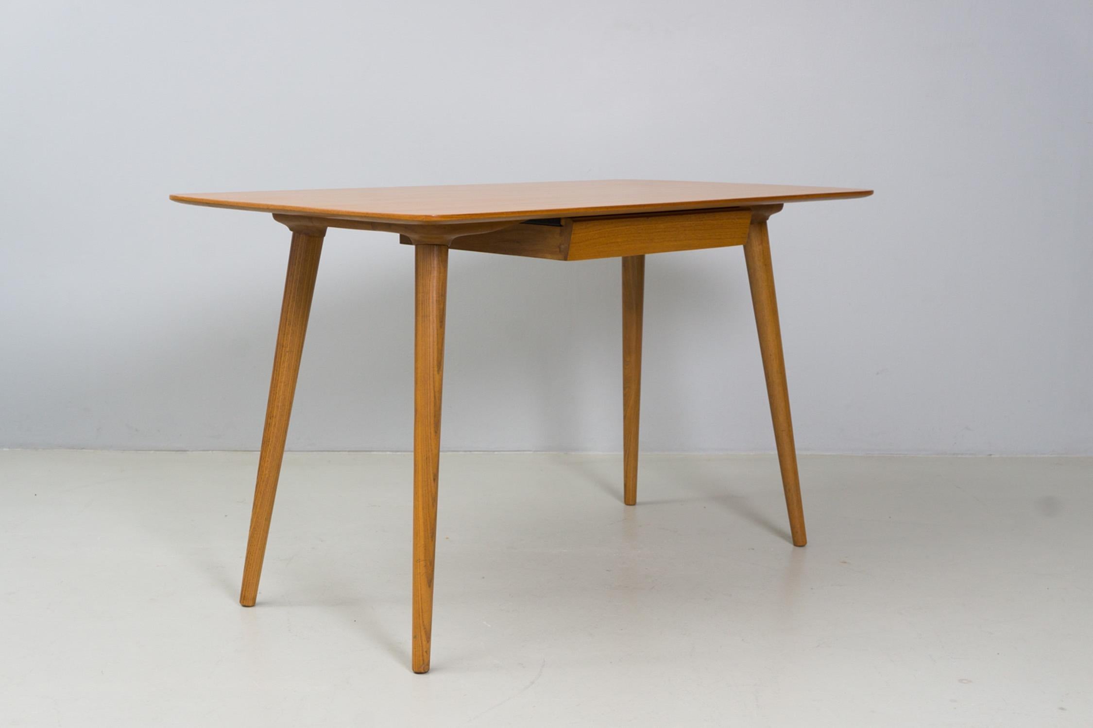 Minimal and elegant desk with drawer. Solid wood construction, take top made of solid elm wood, legs with wooden screw thread. Exhibited at Trienale Milano 1954. 


Osvaldo Borsani was born in 1911 in Italy. He studied architecture at the