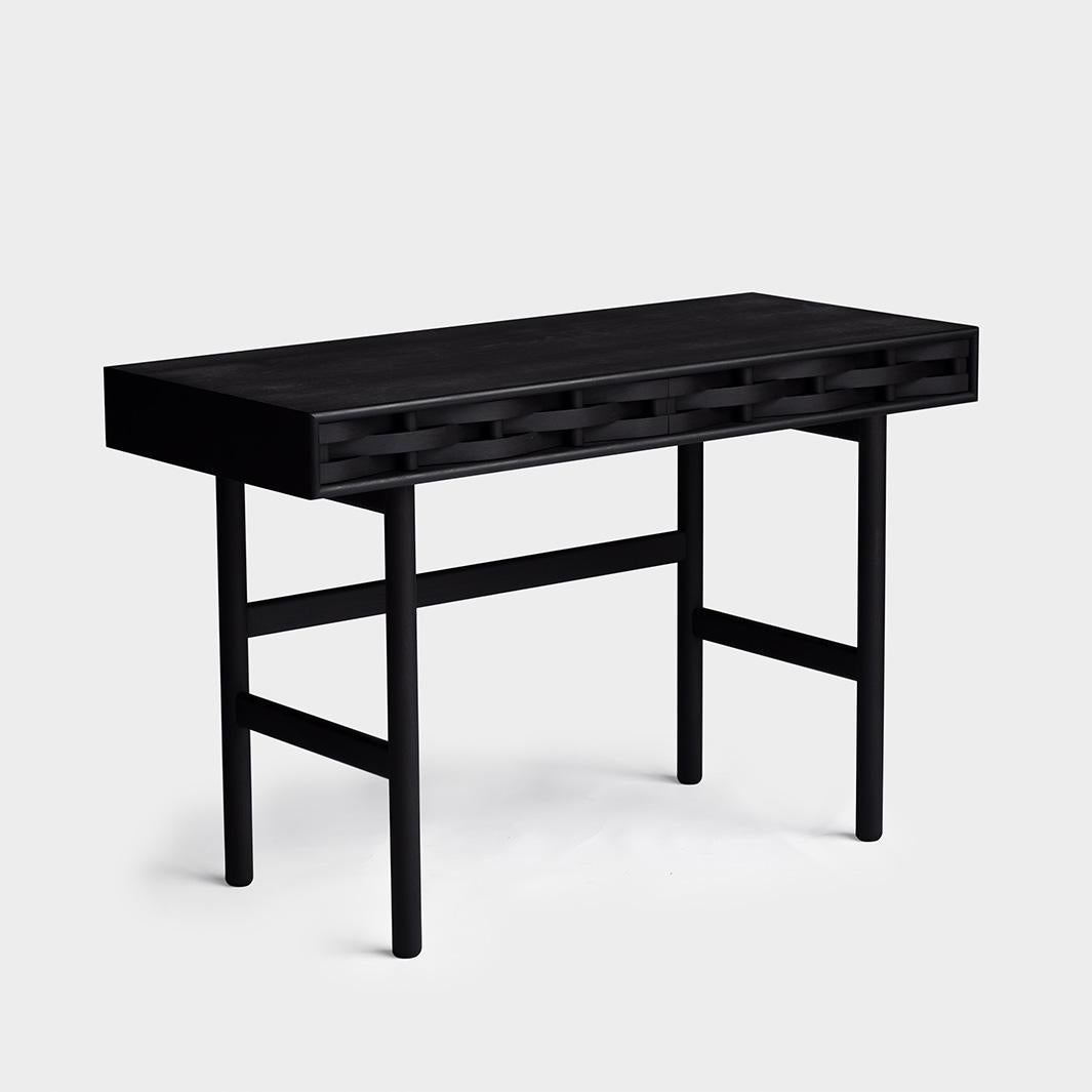 Weave desk 
Weave desk is made of solid birchwood and birchveneér. Modern yet classic, bold yet modest the desk serves as a great example of Scandinavian contemporary design. Designed by Lukas Dahlén.

The minimal yet expressive desk is made of