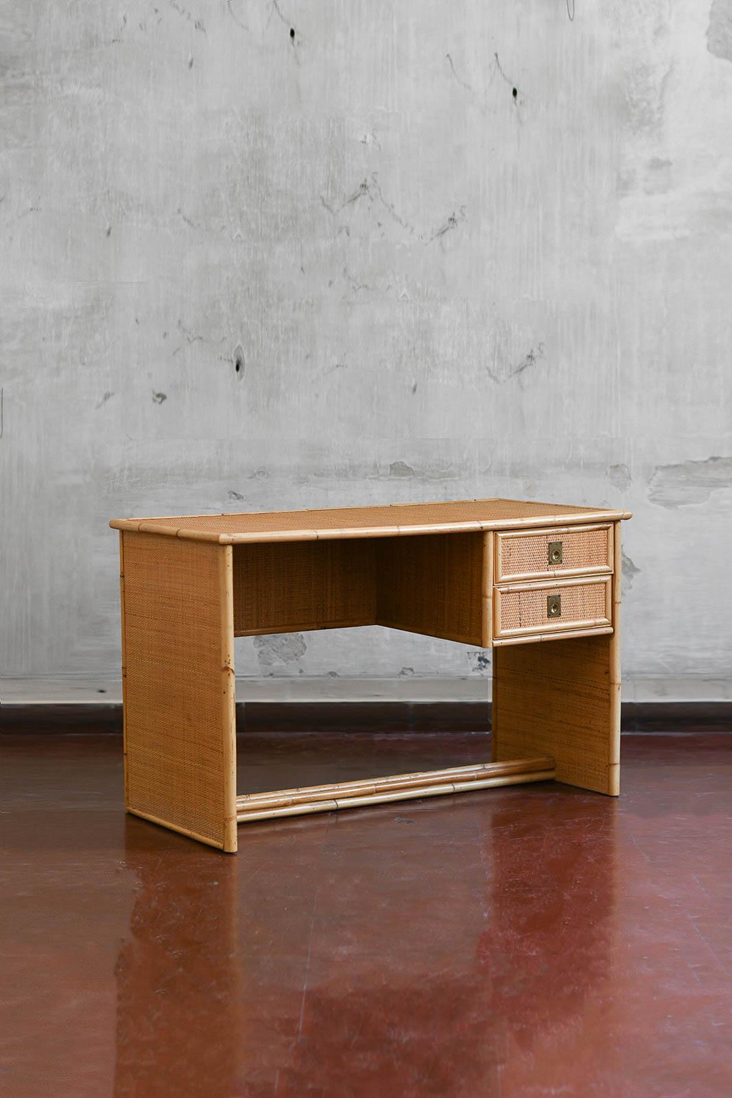 Desk in bamboo and wicker with brass details. Produced by Dal Vera, 1970s  
Product Details
Dimensions 120 W x 75 H x 60 D cm