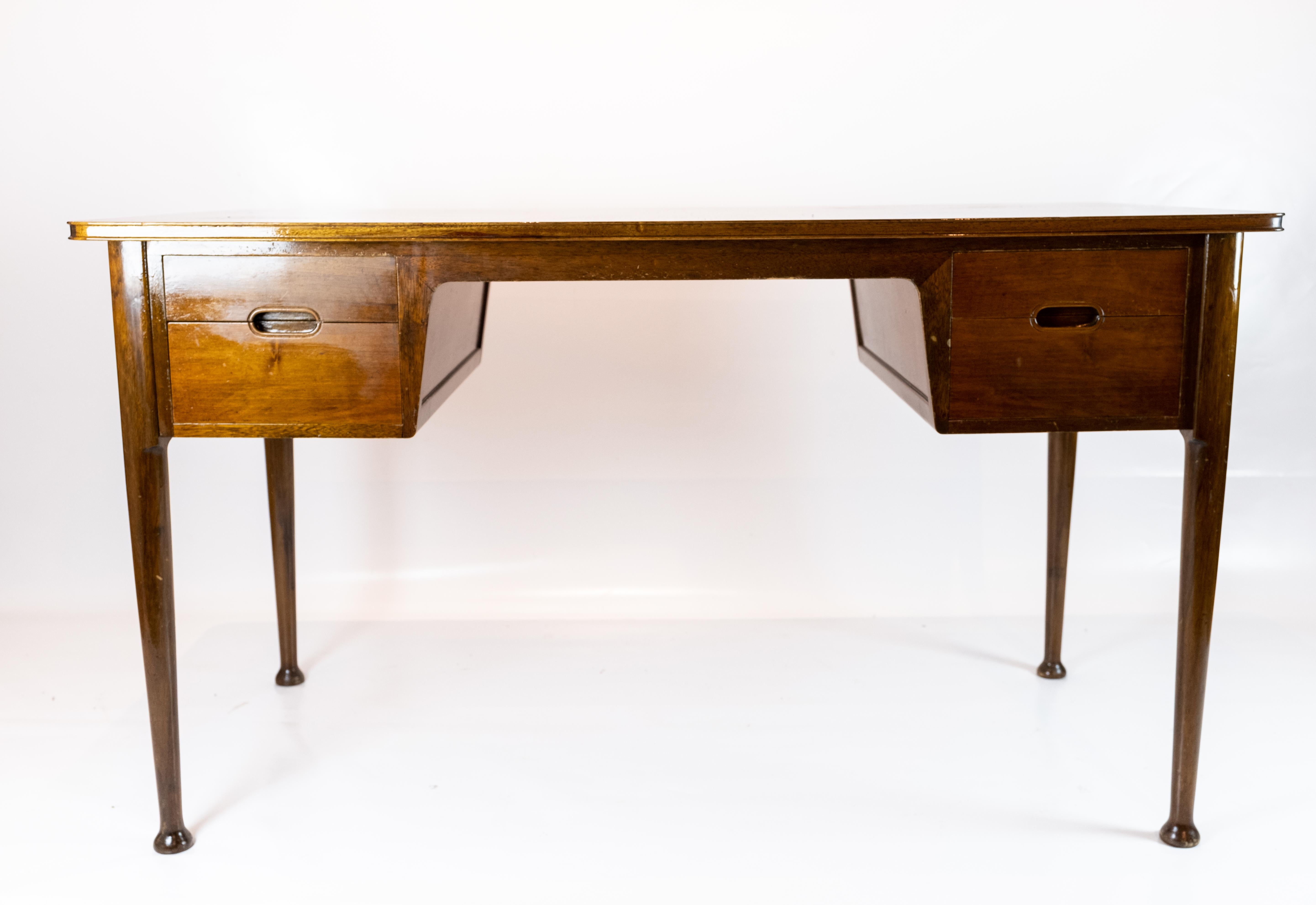 Desk in rosewood of Danish design from the 1960s. The desk is in great vintage condition.
 