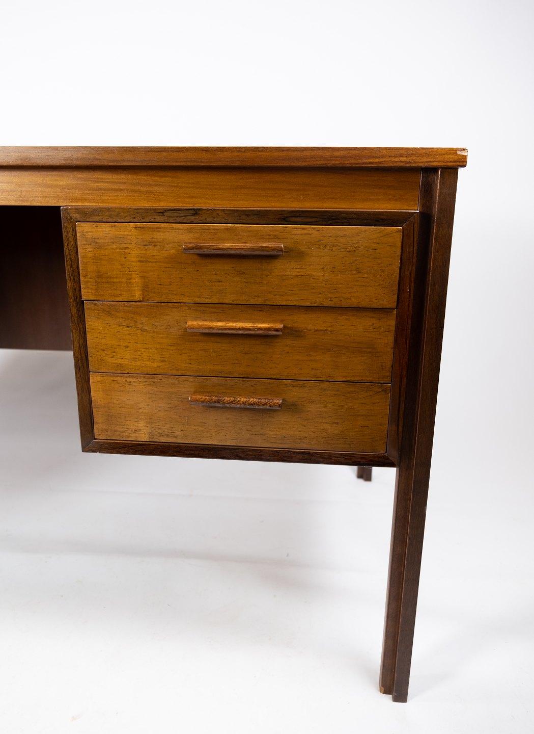 Mid-20th Century Desk in Rosewood of Danish Design from the 1960s. 