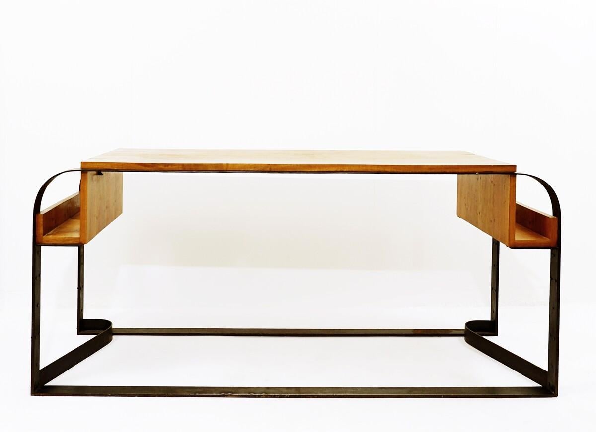 Desk in solid wood and wrought iron in the style of Eugène Printz.
