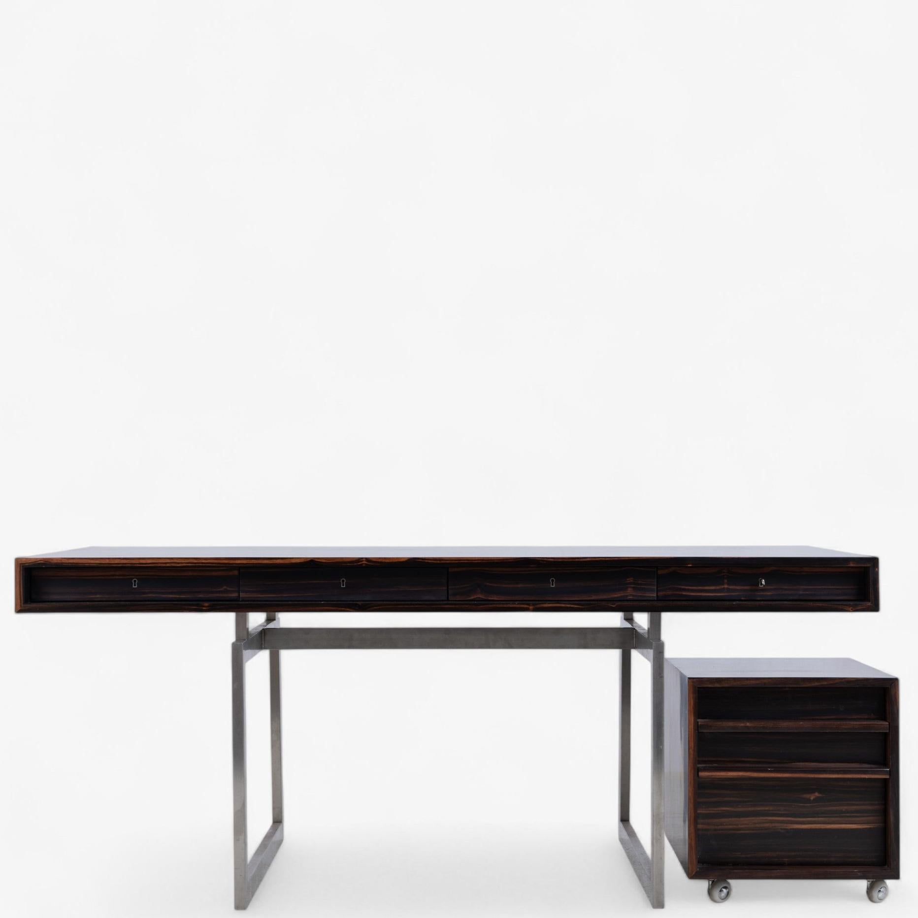 Desk in walnut with four drawers, drawer module on castors and frame in steel. Designed by Bodil Kjaer and made by Hot House.