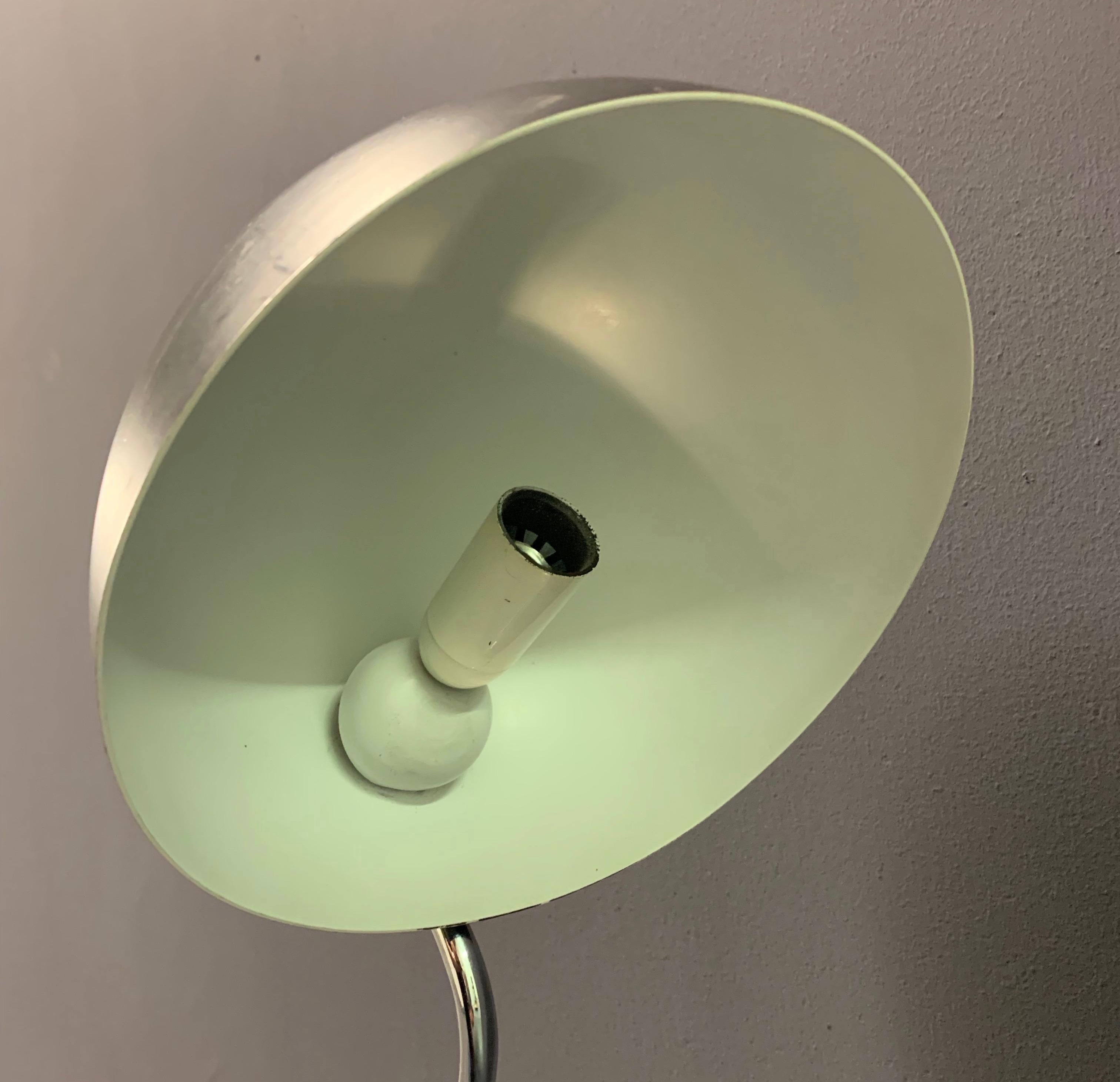 It´s the second time i see such a lamp in 20 years. The first i saw on a design fair had an old Arteluce sticker inside and you could see, that the sticker was not clued later..... But i did not find out anything about the lamp........ The metal