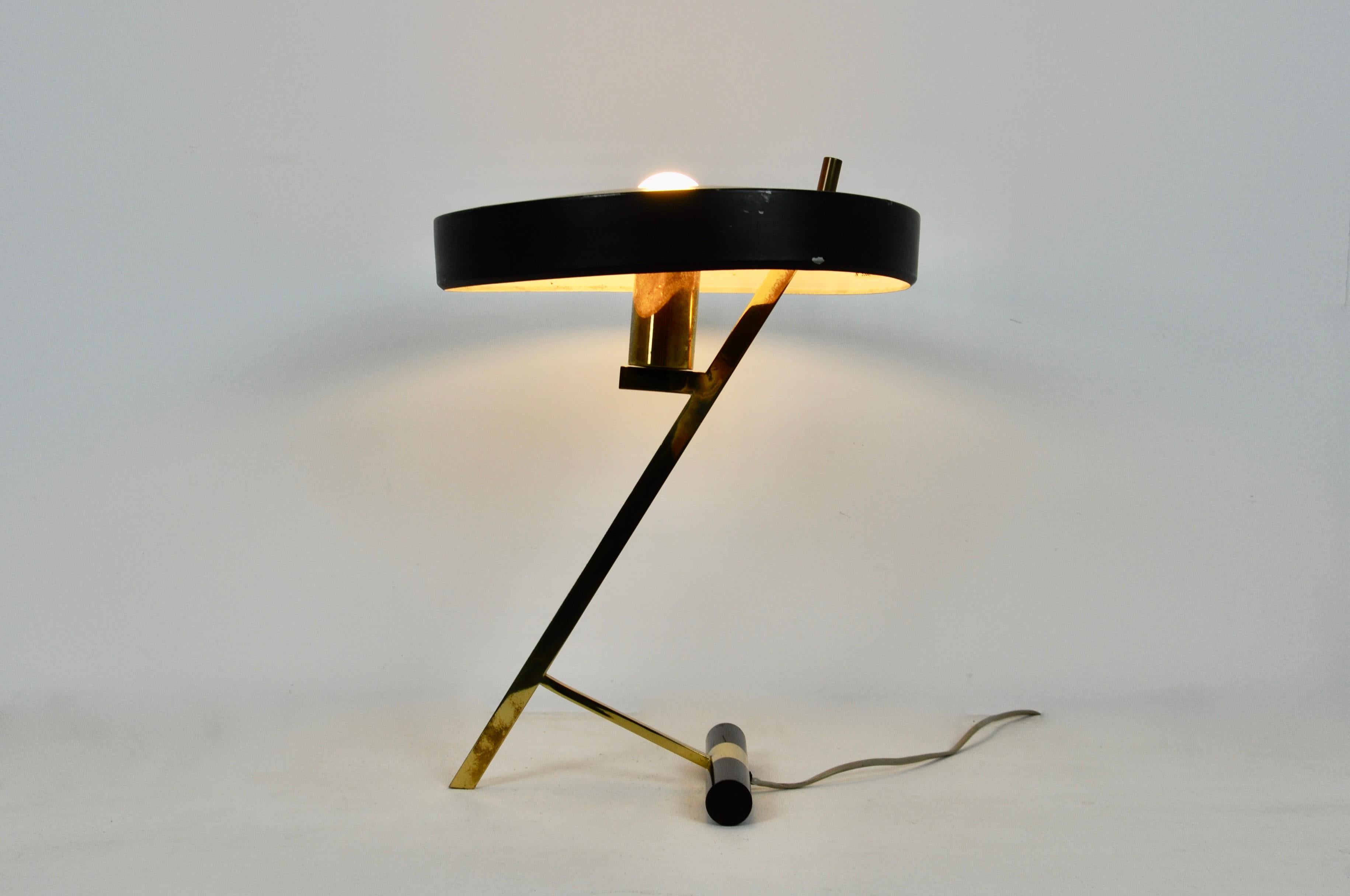 Lamp in metal and brass stamped Phillips. Wear on the top of the lamp (see photo)