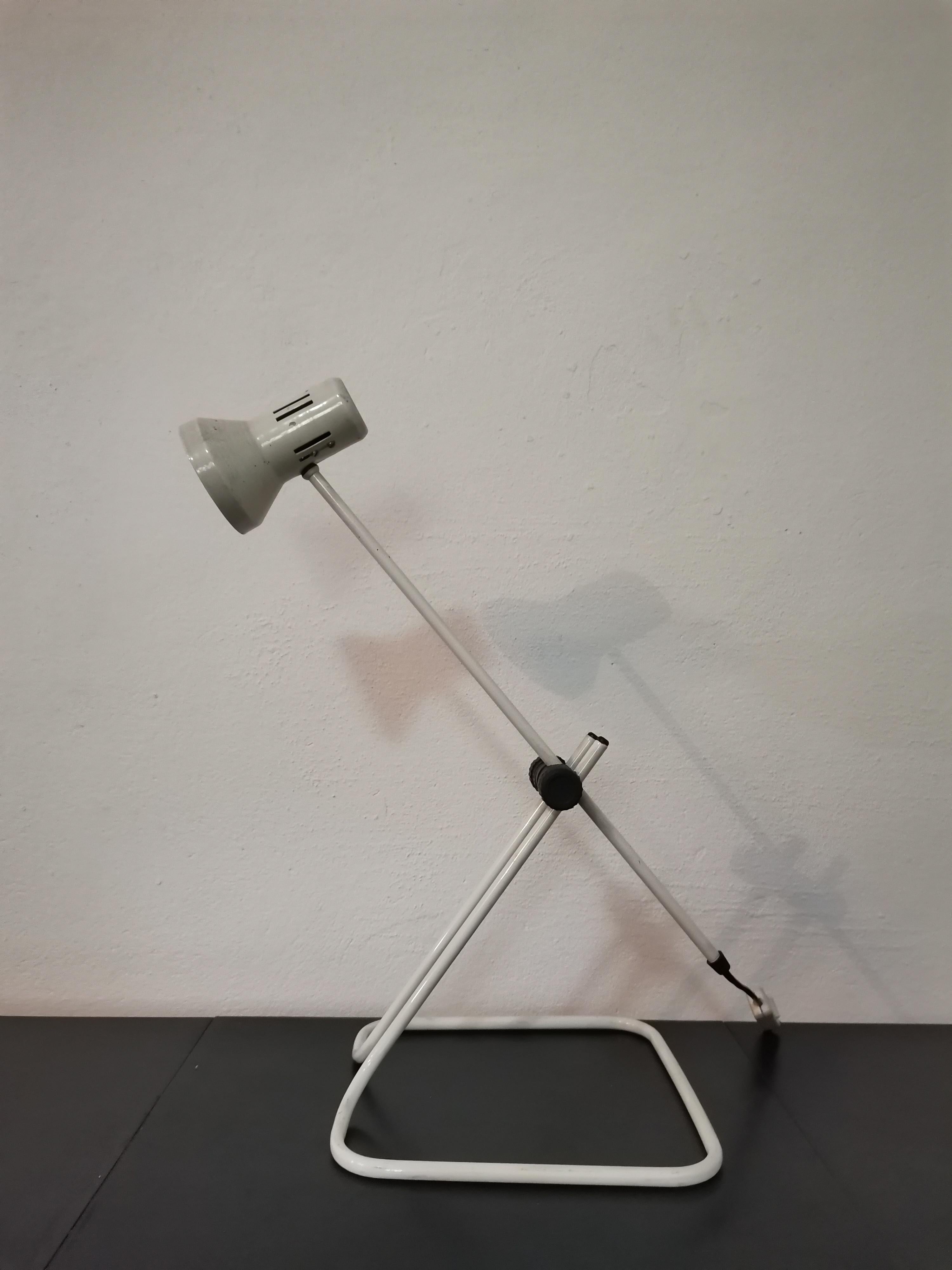 Desk Lamp/Table Lamp, 1970s

Period: 1970s

Style: midcentury modern design

Colour: white, black

Material: metal, plastic

Condition: original vintage condition with slight traces of use, fully finctional