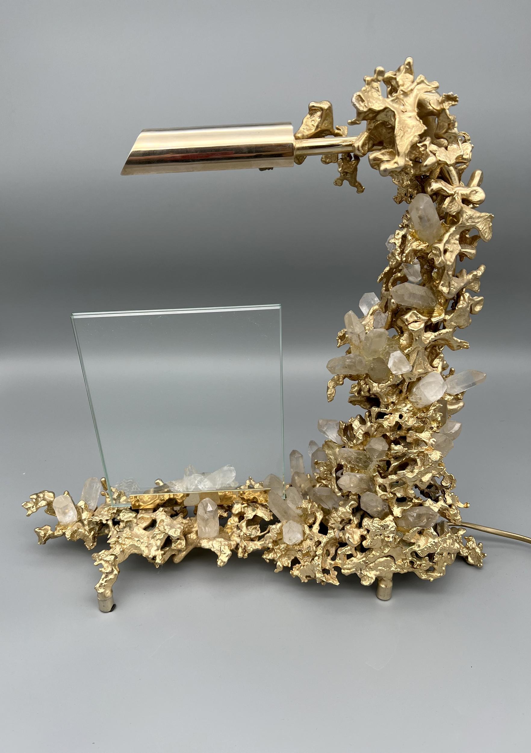 Beautiful lamp with photo holder in exploded bronze gilded in 24 K fine gold, supporting numerous rock crystals.

Biography Claude Victor Boeltz, France (1937)

Claude-Victor Boeltz, is born in 1937 in Paris. Complete artist (sculpture, painting,