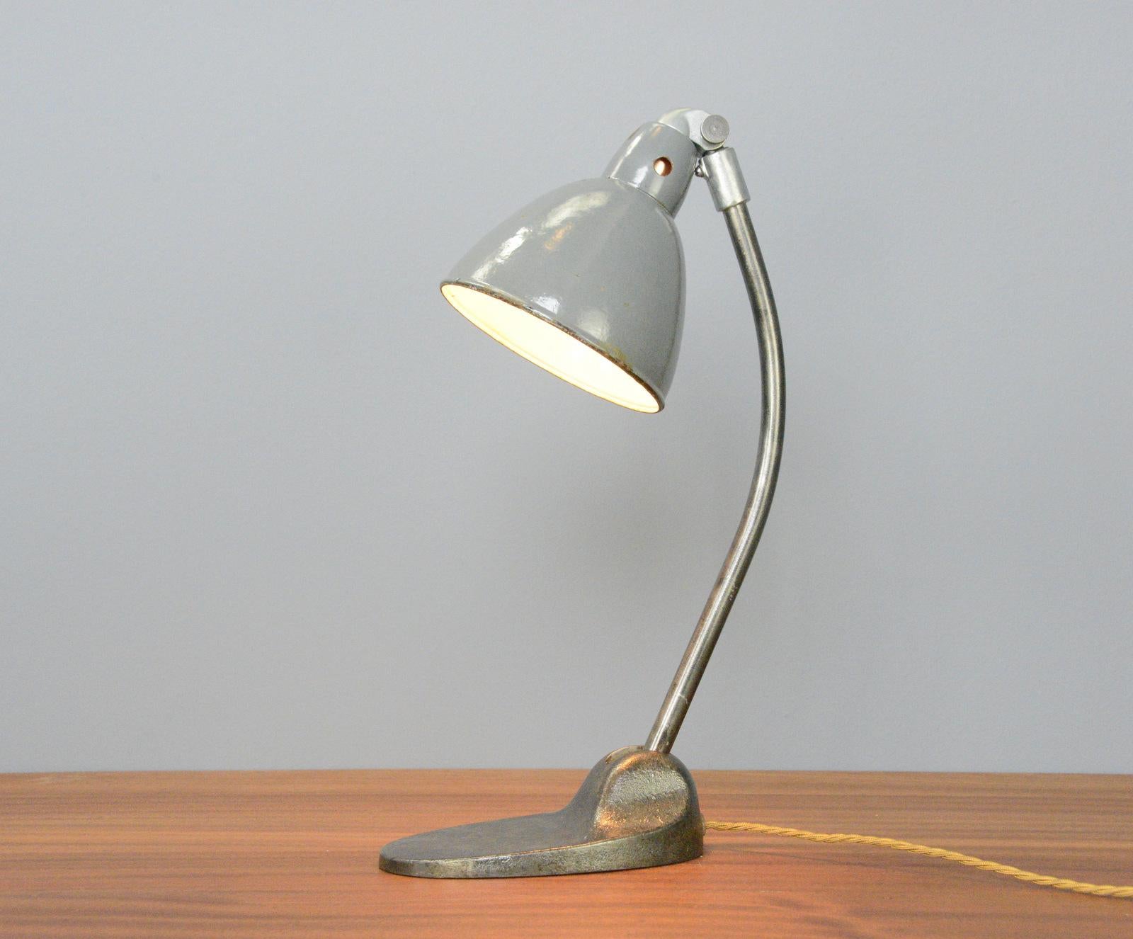 Desk lamps by Siemens Circa 1930s

- Cast iron base
- Adjustable steel arm and shade
- Takes E27 fitting bulbs
- Produced by Siemens, Berlin
- German ~ 1930s
- 45cm tall x 21cm deep x 16cm wide

Condition Report

Fully restored with