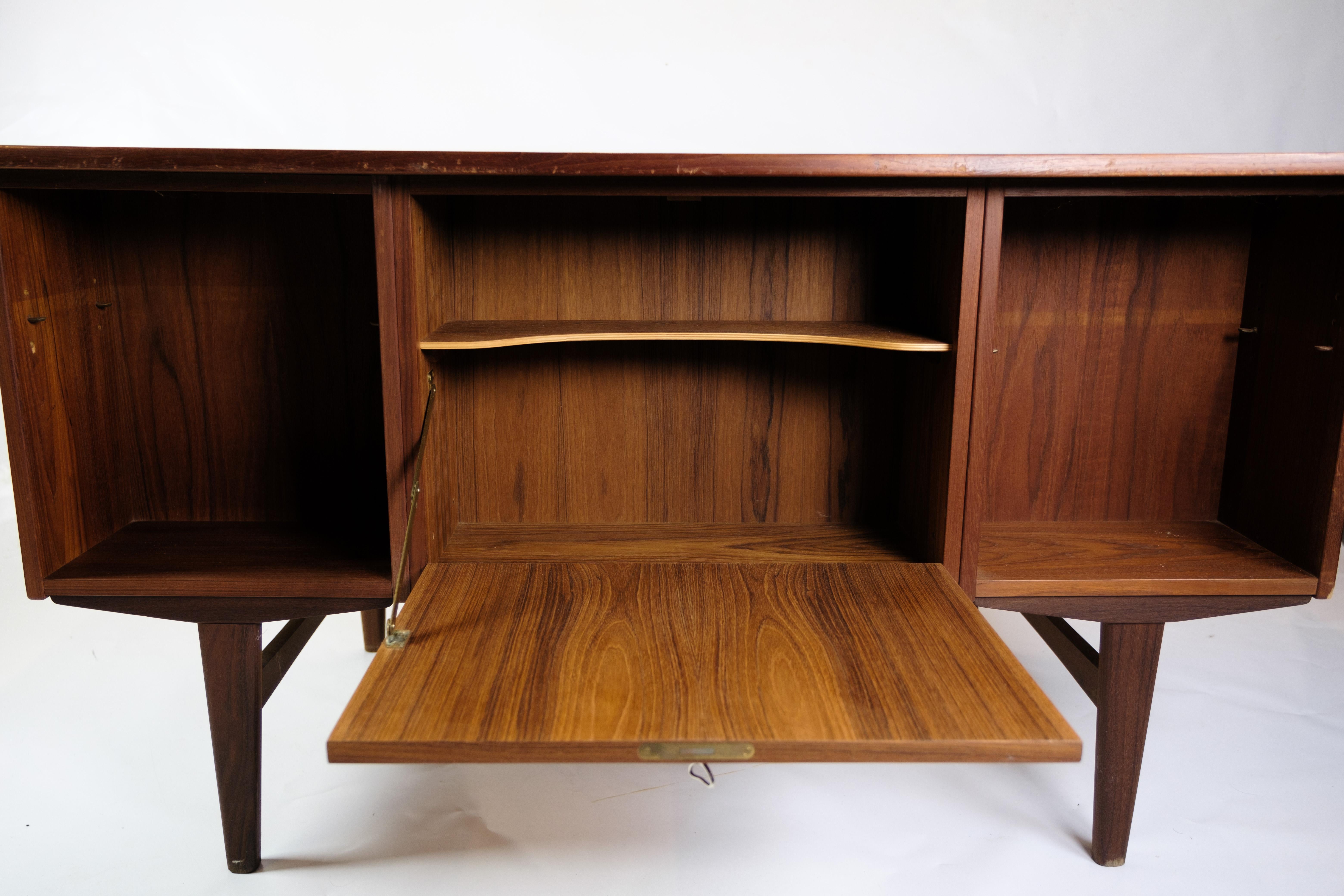 Schreibtisch aus Teakholz mit schwebender Tischplatte aus den 1960er Jahren im Angebot 7