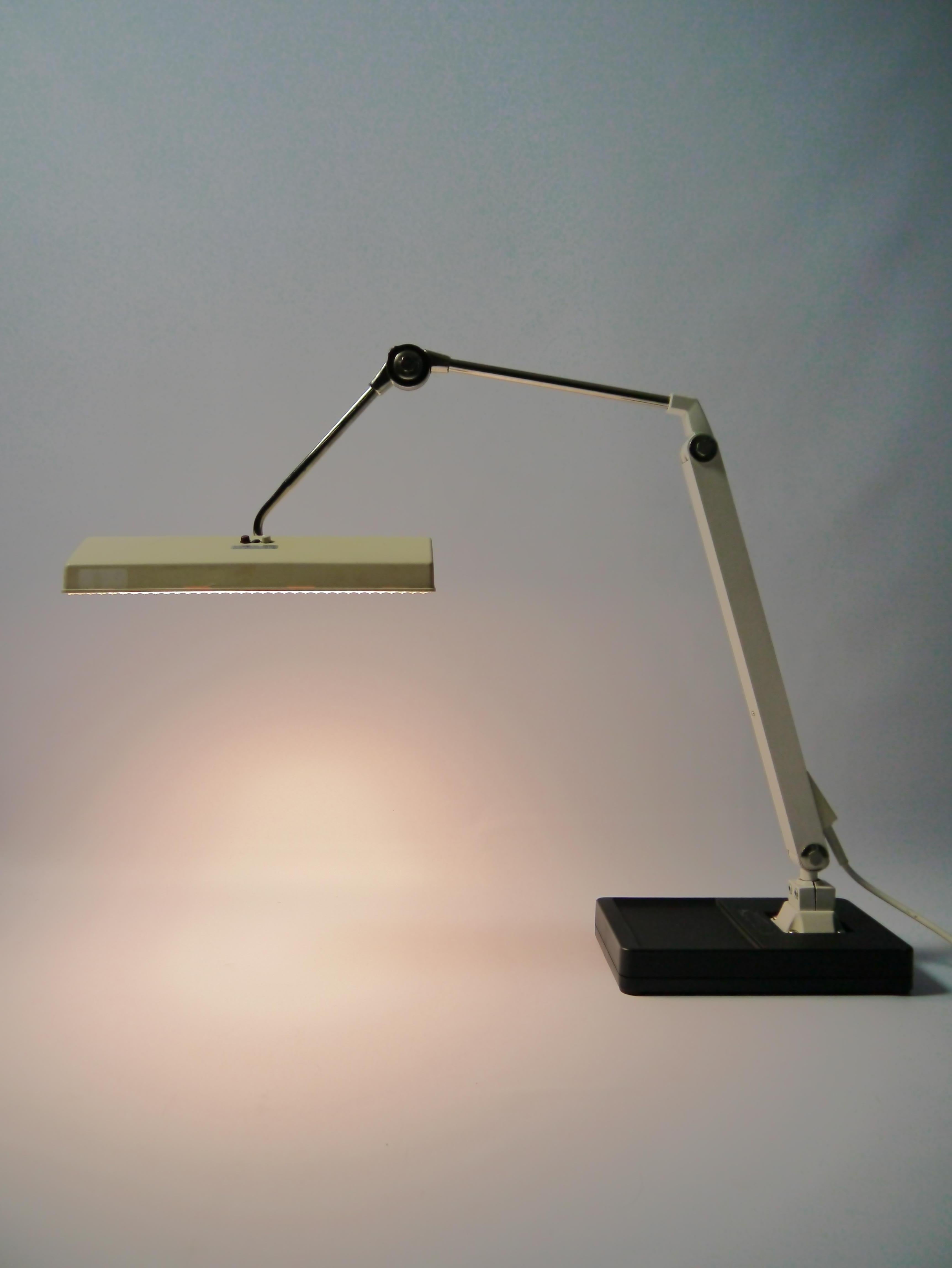 Desk / office lamp model ST208z fabricated by Waldmann Leuchten, West Germany, 1960s. 

The lamp fits two fluorescent lamp tubes of 8W, included in delivery. 

 